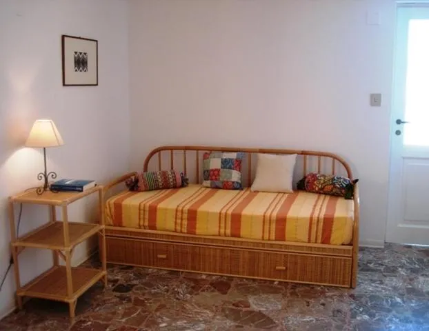 Seating area, Bed in Case Vacanze Arcobaleno