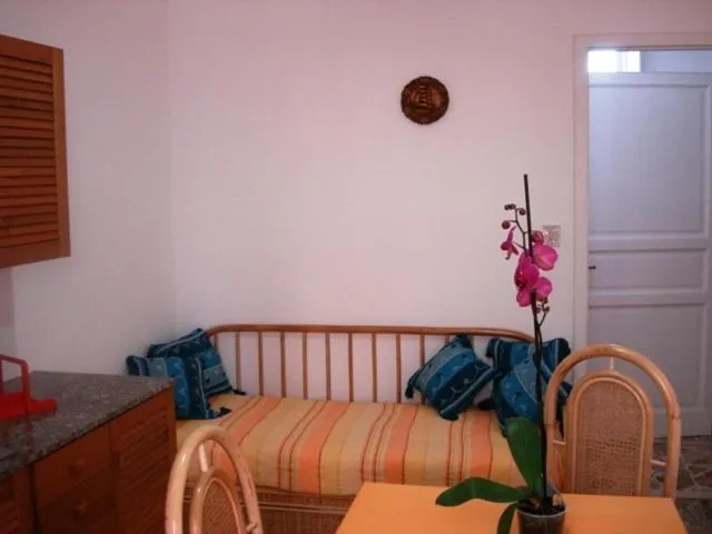 Seating area, Bed in Case Vacanze Arcobaleno