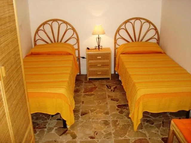 Bed in Case Vacanze Arcobaleno