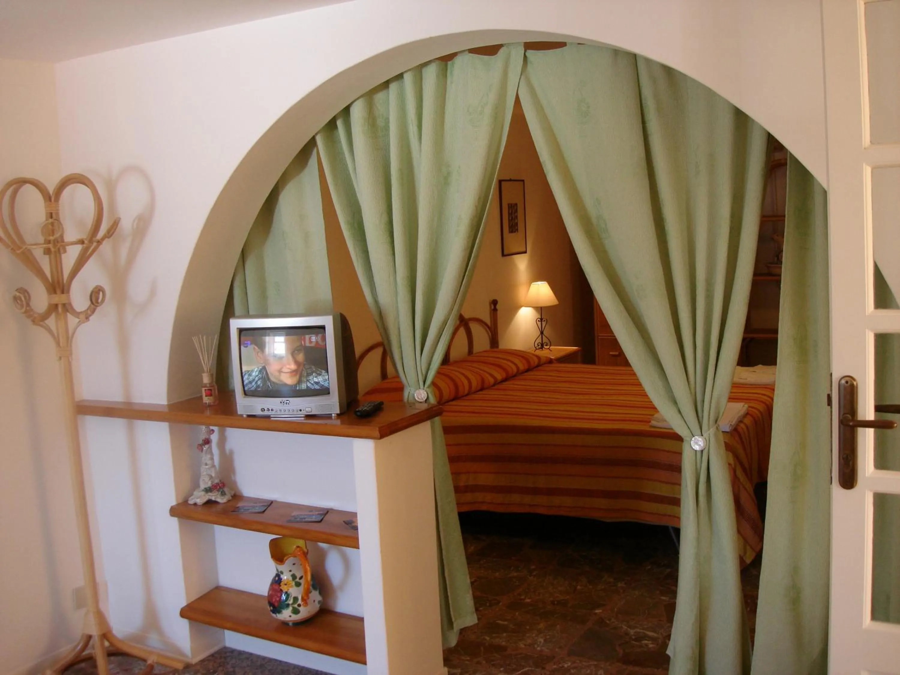 Decorative detail, Bed in Case Vacanze Arcobaleno