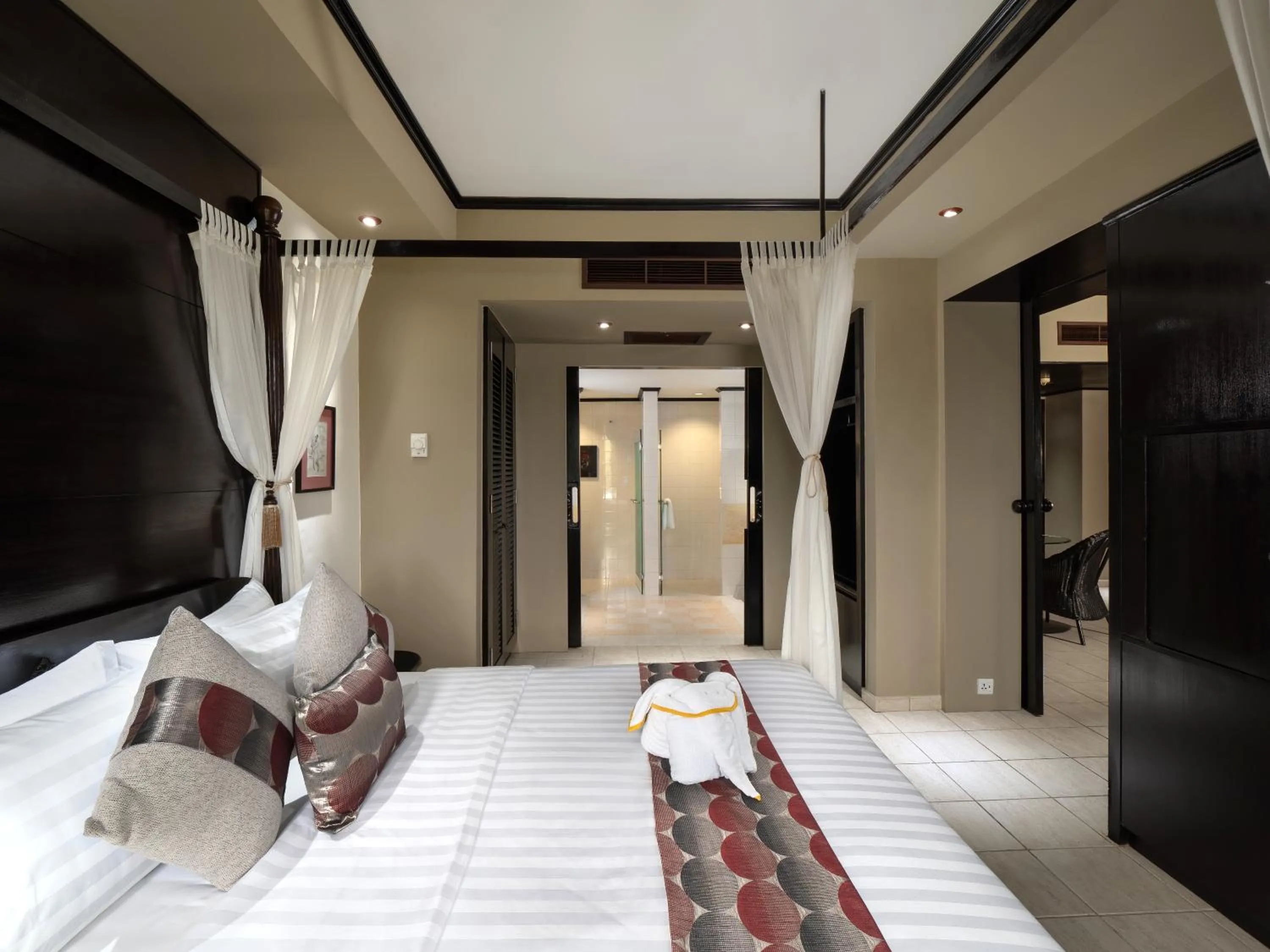 Bed in Nirwana Resort Hotel