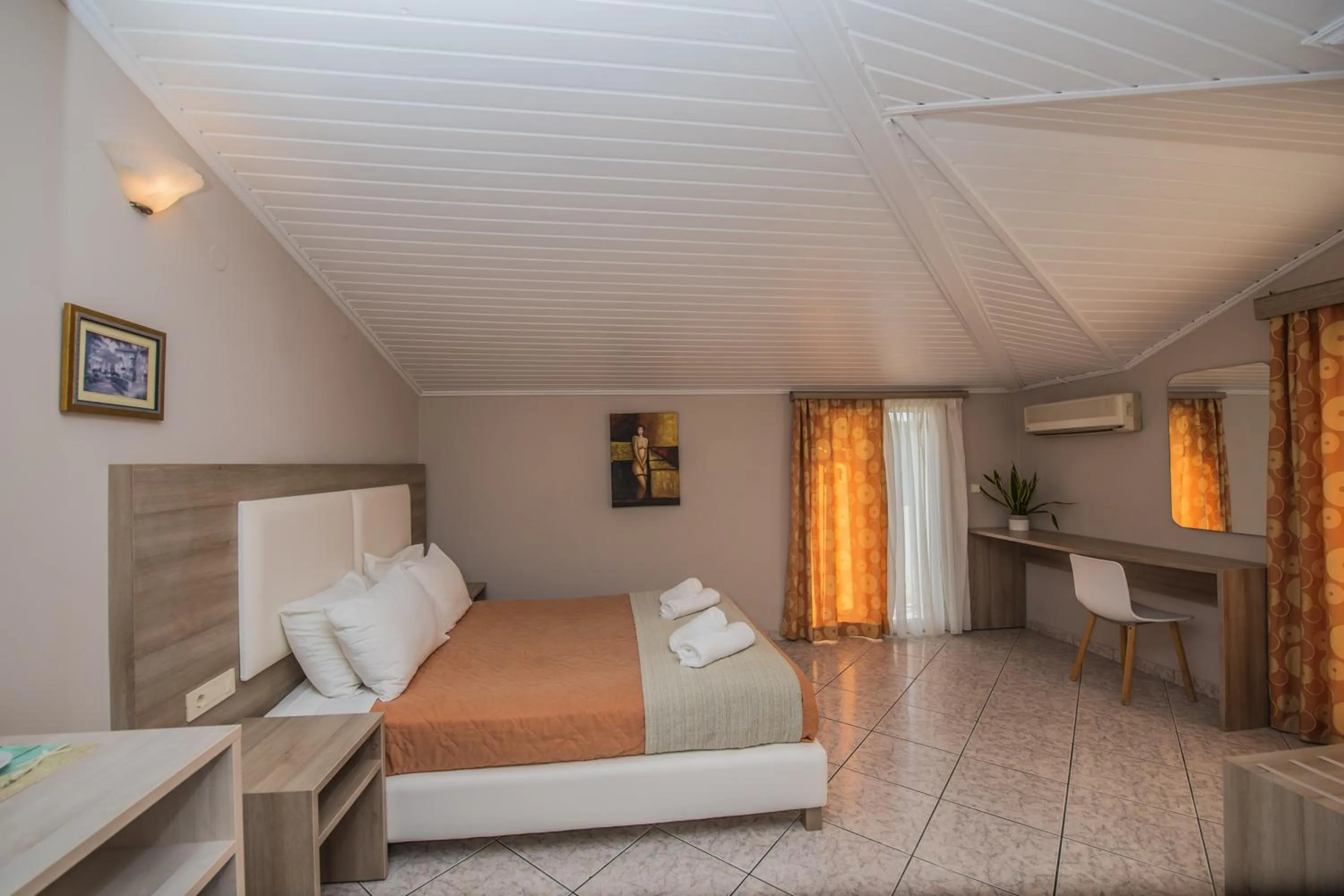 Bed in Planos Beach Hotel