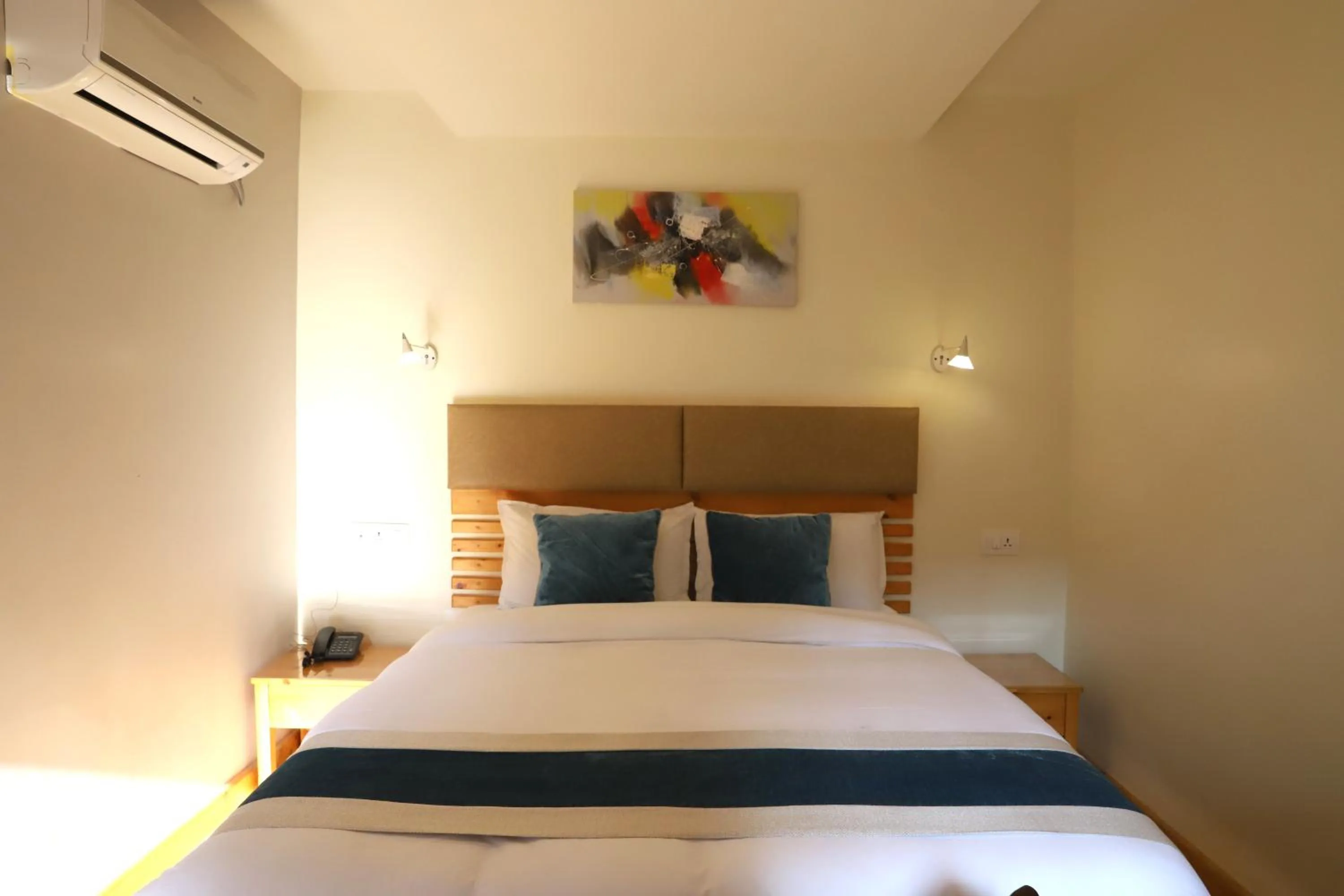 Bed in Nepal Cottage Resort