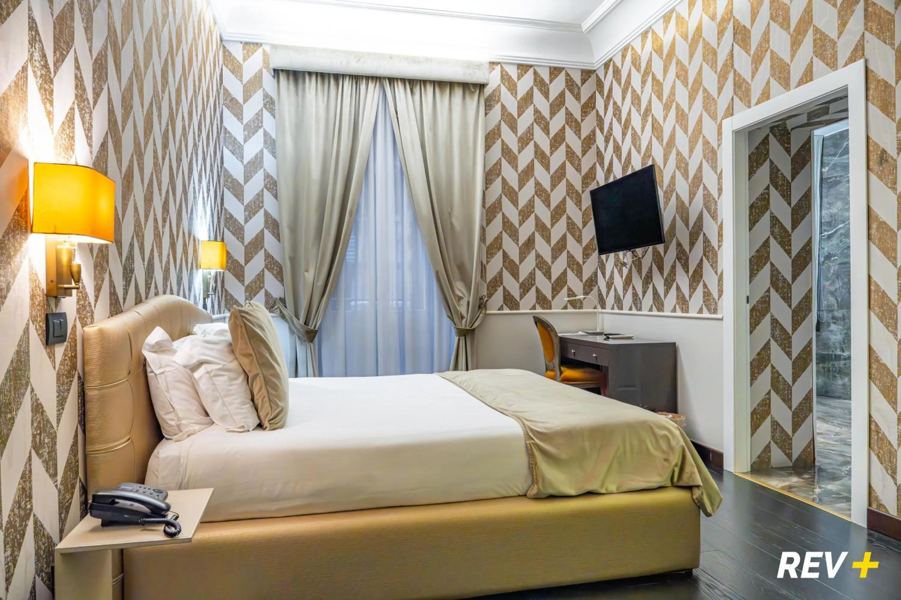 Photo of the whole room, Bed in Via Veneto Suites