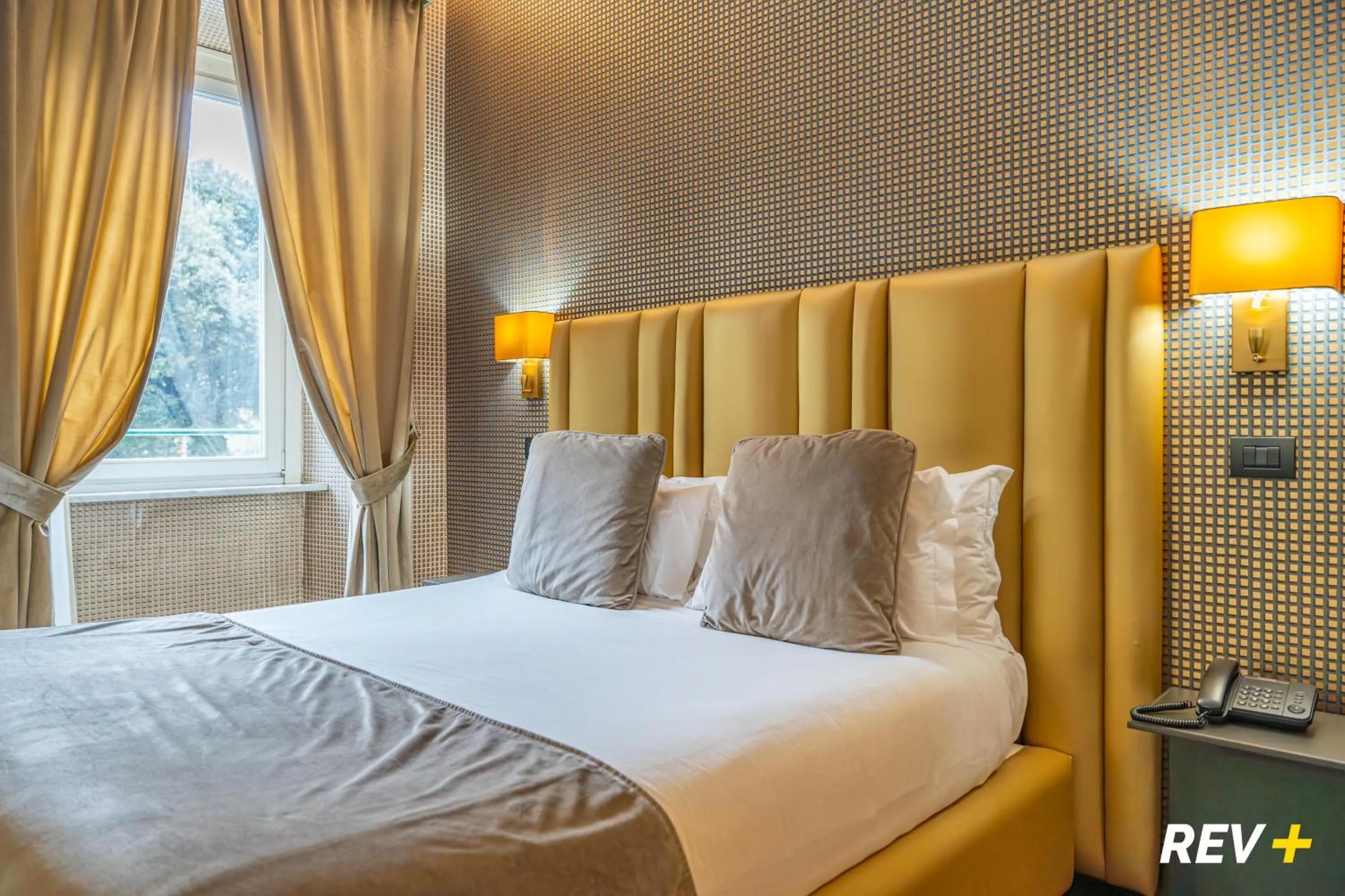 Photo of the whole room, Bed in Via Veneto Suites