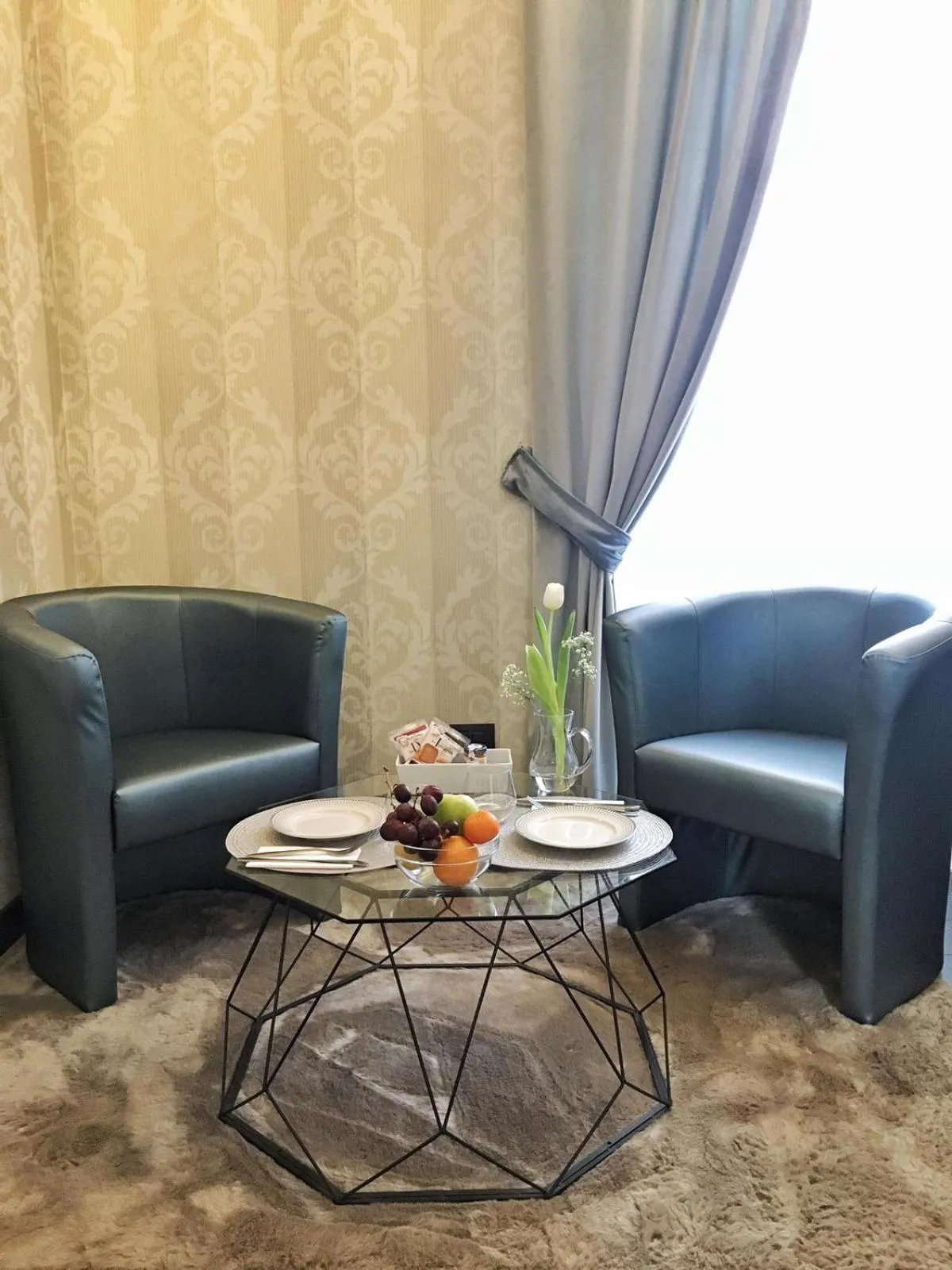 Photo of the whole room in Via Veneto Suites