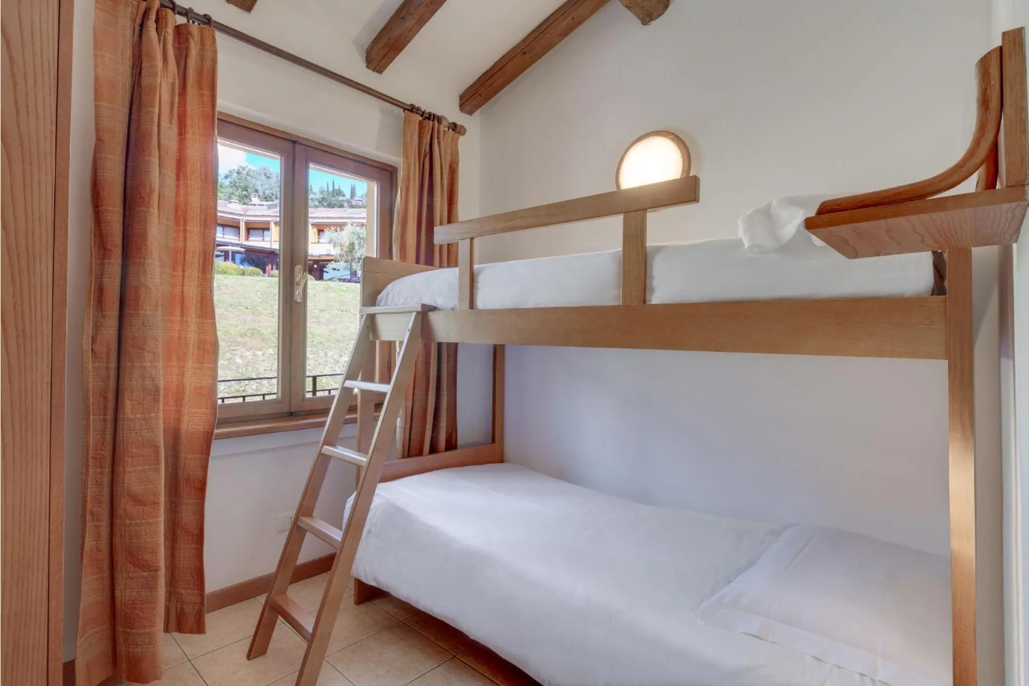 Bedroom, Bed in Poiano Garda Resort Appartamenti