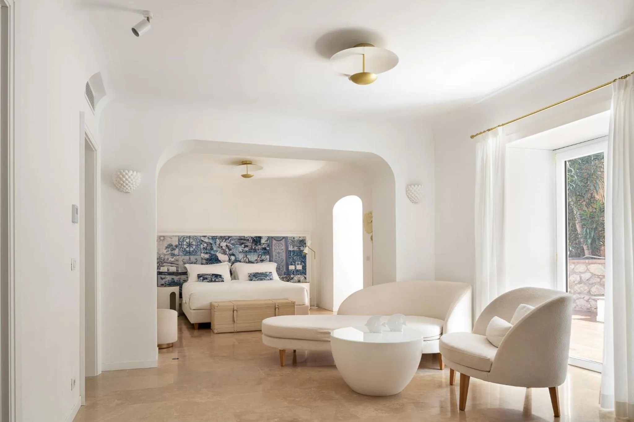 Living room, Bed in La Residenza Capri