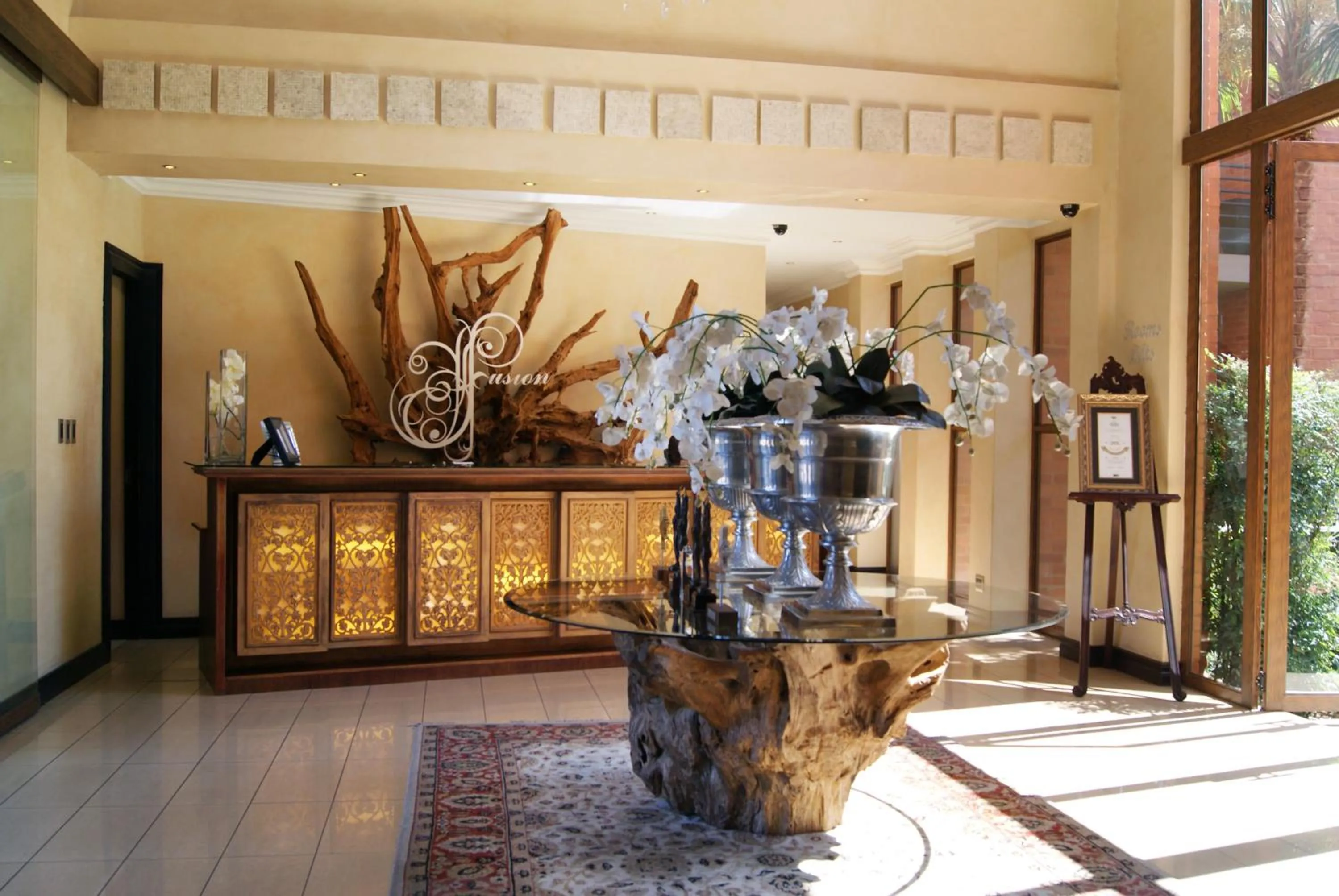 Lobby or reception in Fusion Boutique Hotel