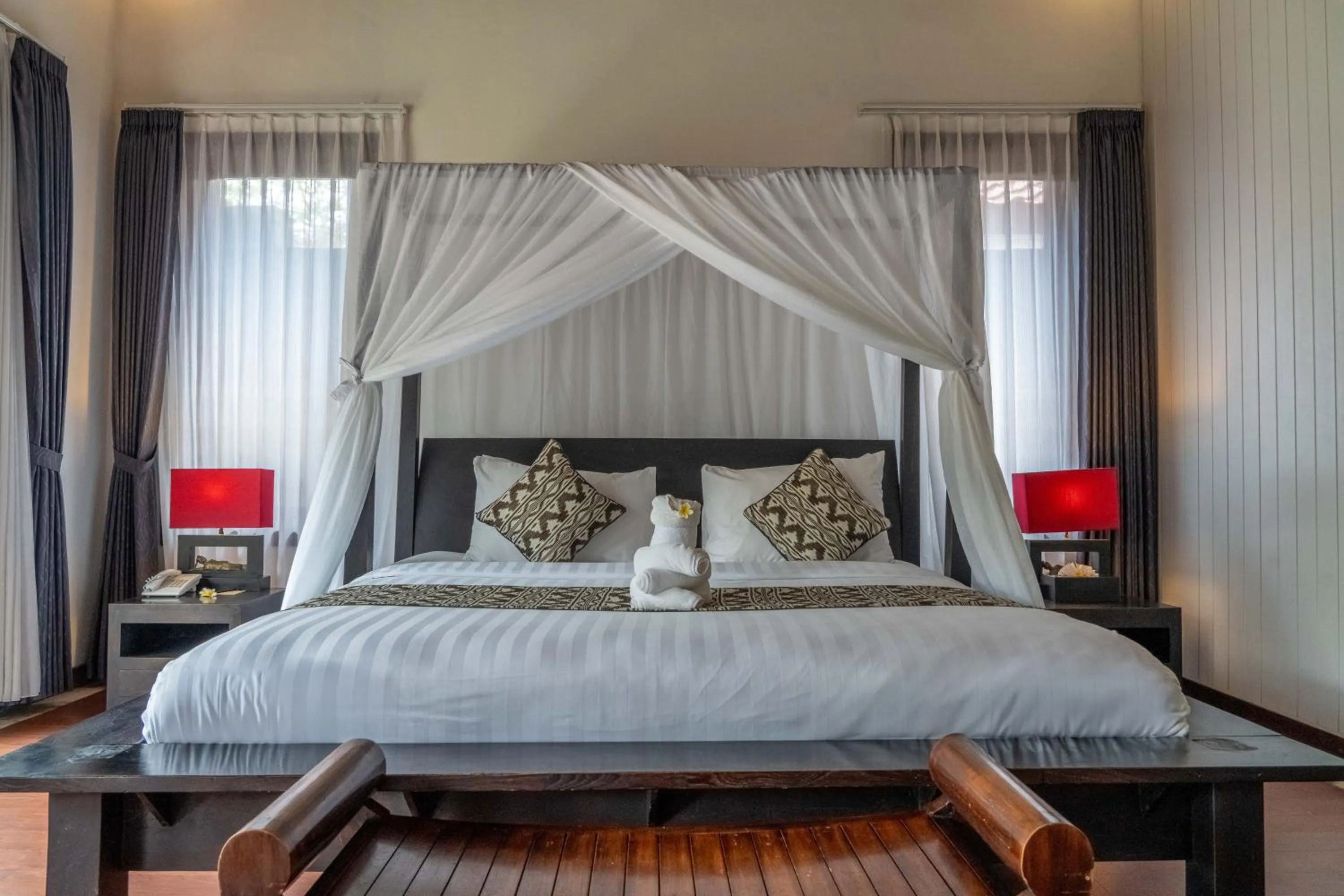 Bed in Bali Prime Villas Seminyak by Kanaya Hospitality