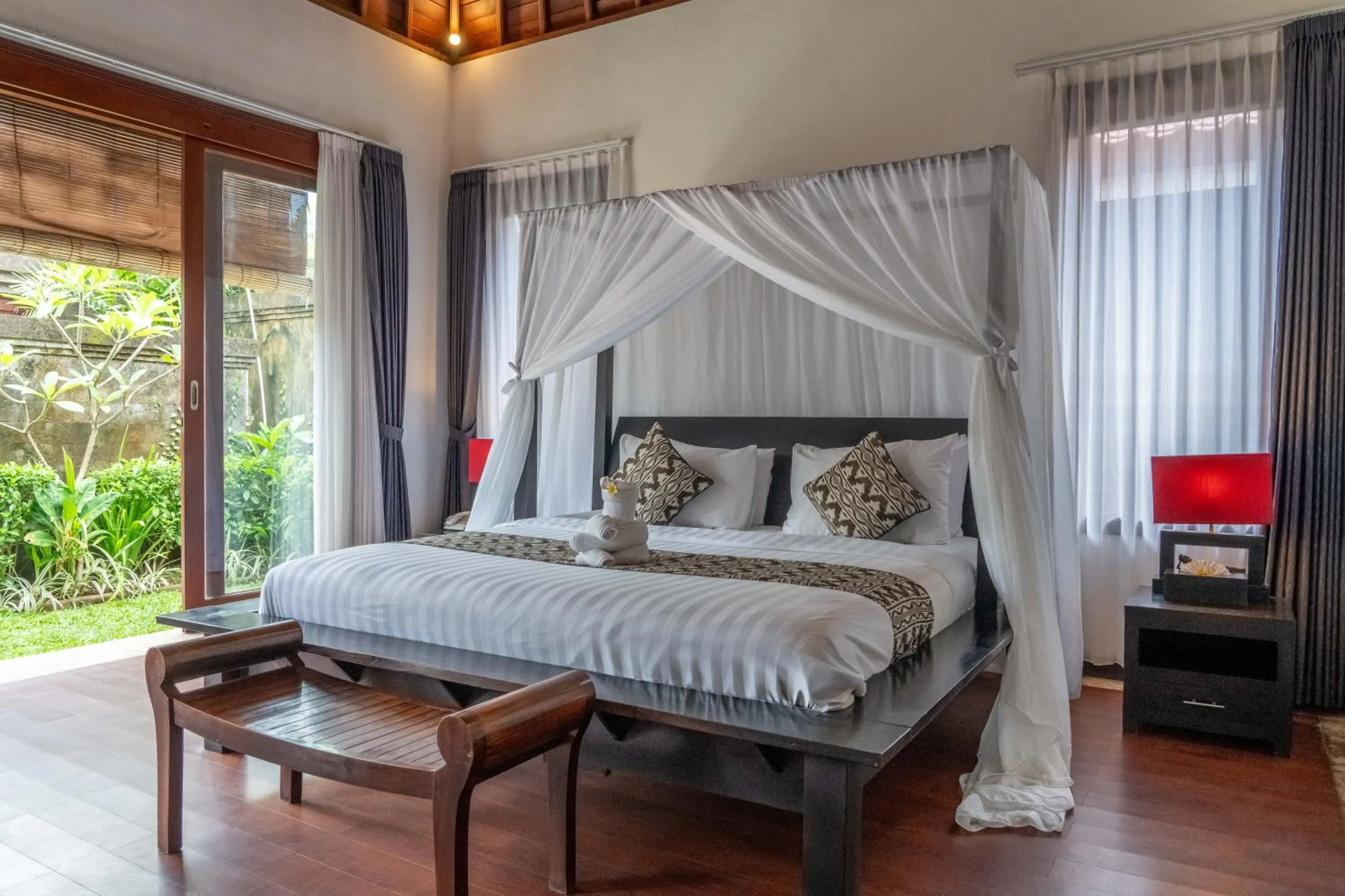 Bed in Bali Prime Villas Seminyak by Kanaya Hospitality