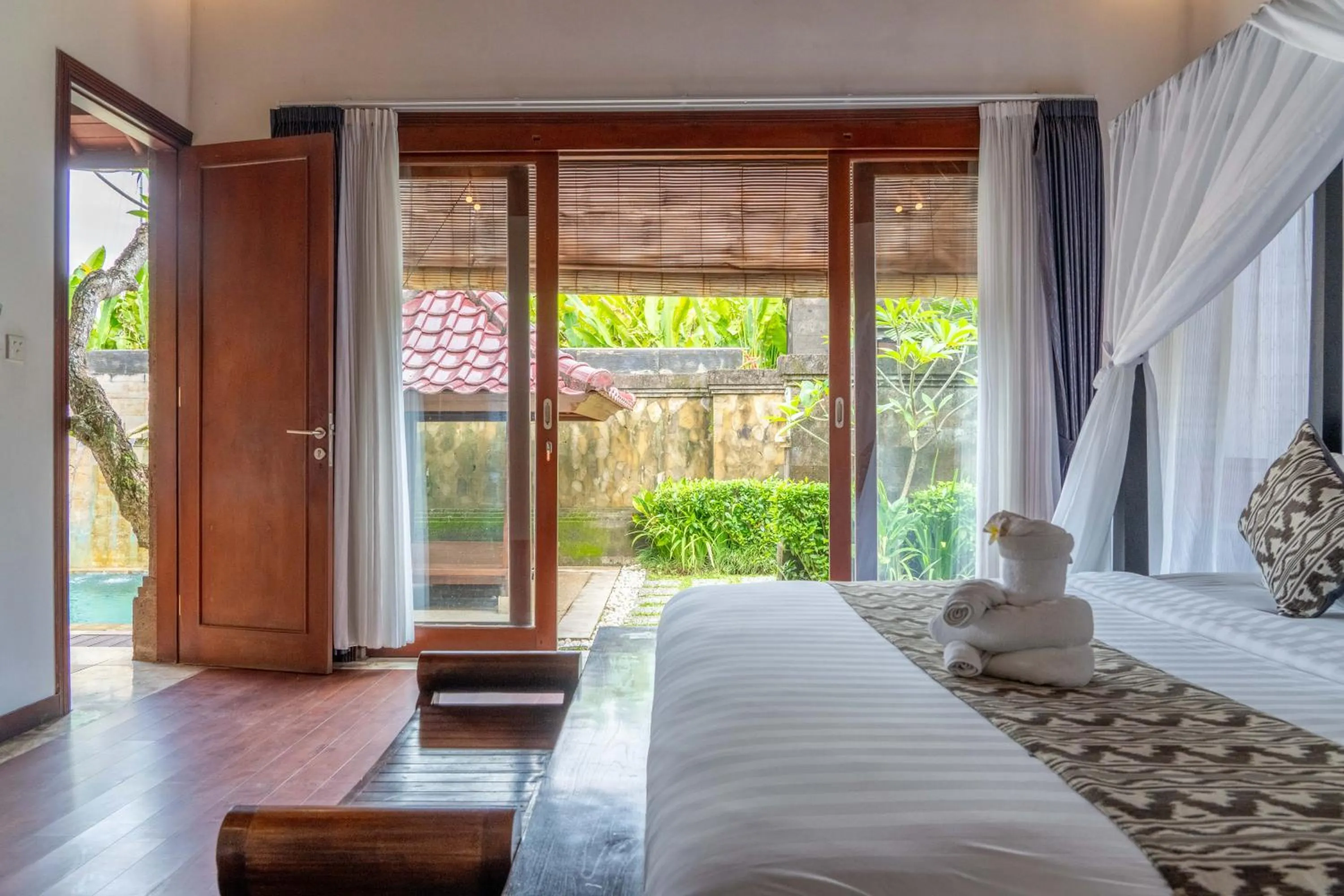 Bed in Bali Prime Villas Seminyak by Kanaya Hospitality