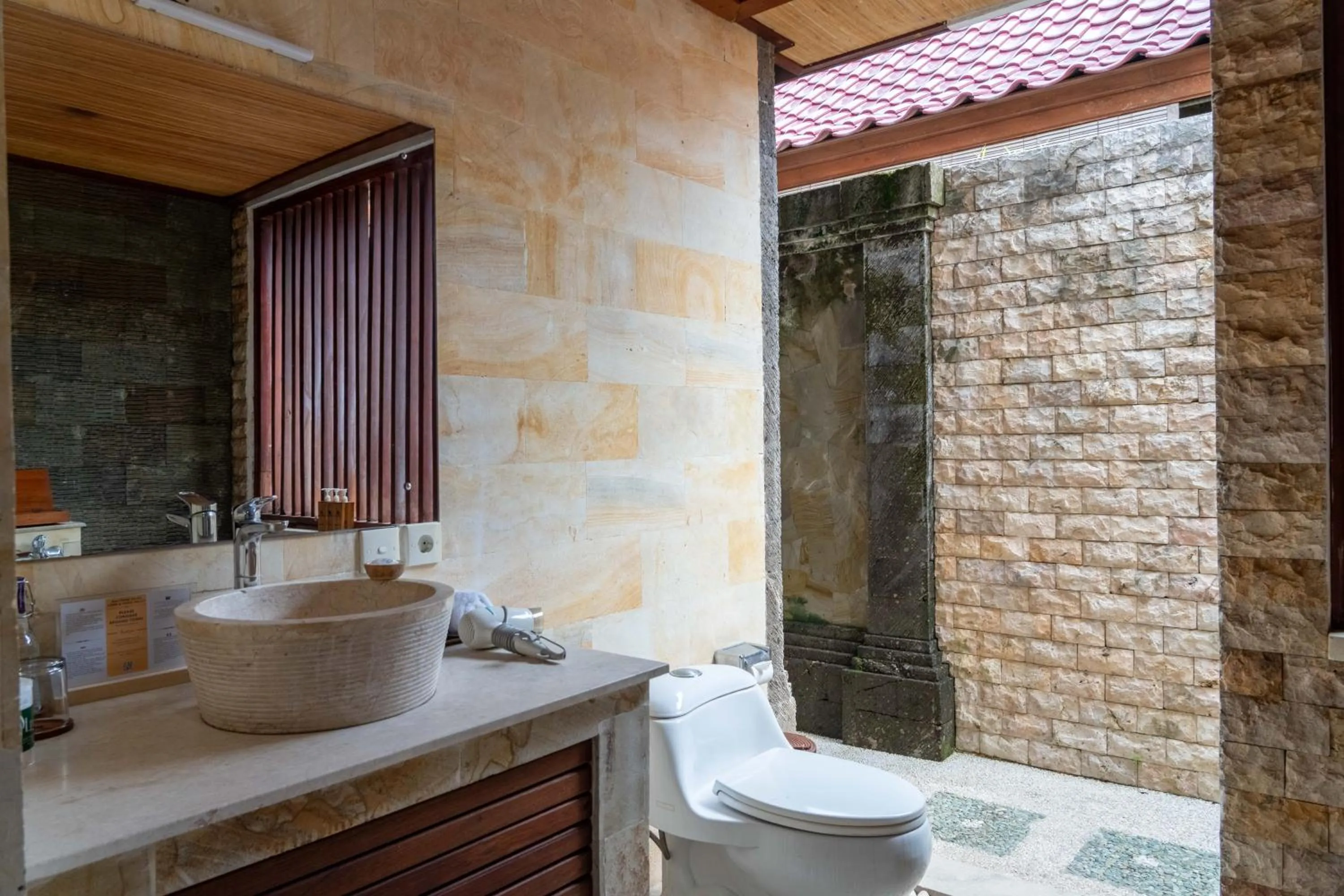 Shower in Bali Prime Villas Seminyak by Kanaya Hospitality