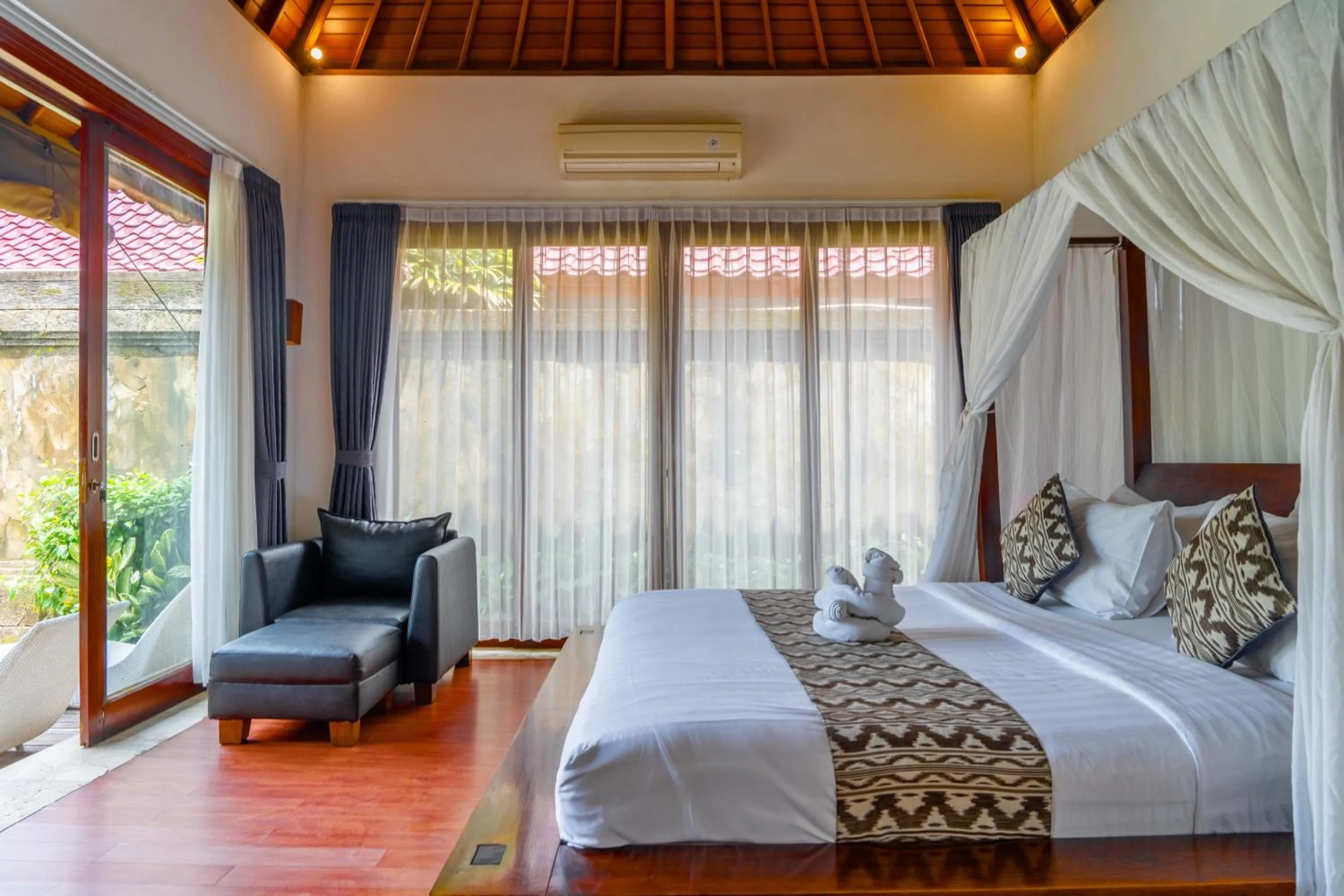 Bed in Bali Prime Villas Seminyak by Kanaya Hospitality