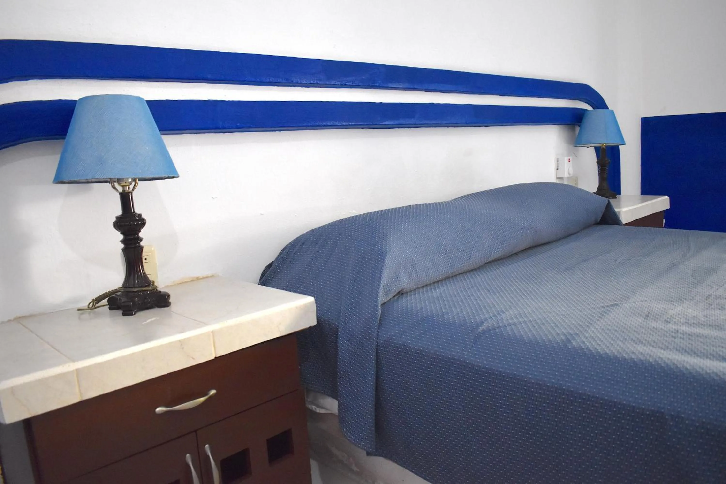 Bed in Plaza Almendros Hotel Isla Mujeres