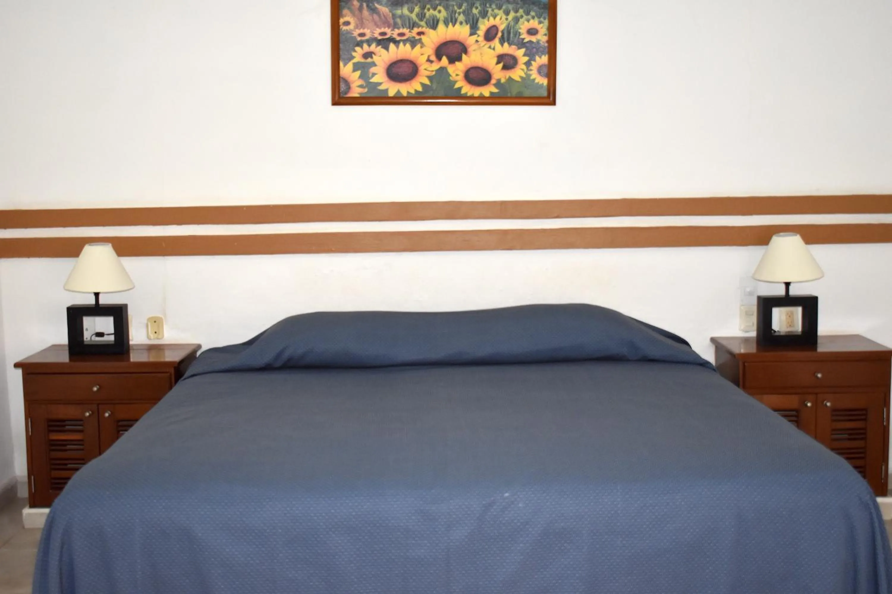 Bed in Plaza Almendros Hotel Isla Mujeres