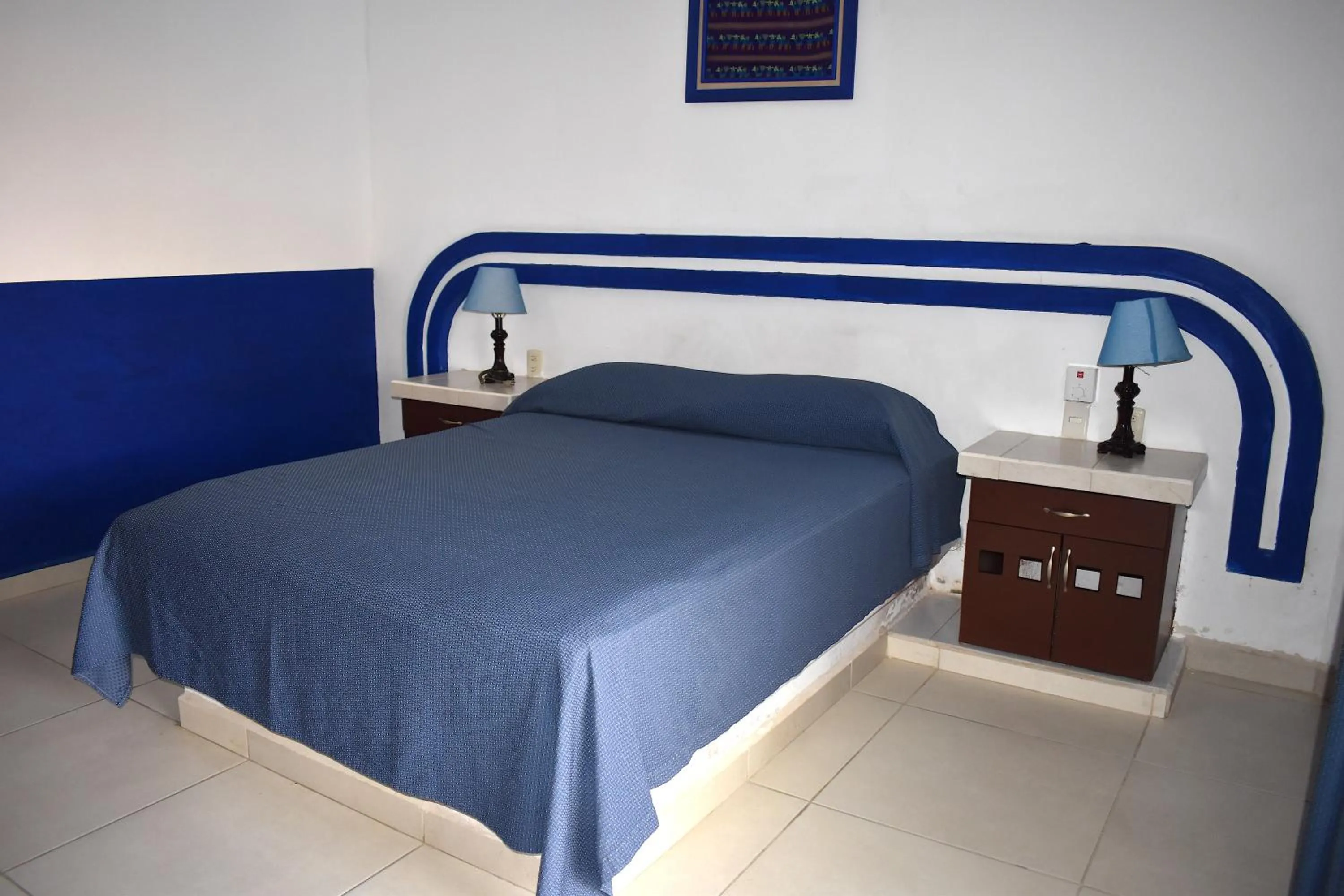 Bed in Plaza Almendros Hotel Isla Mujeres