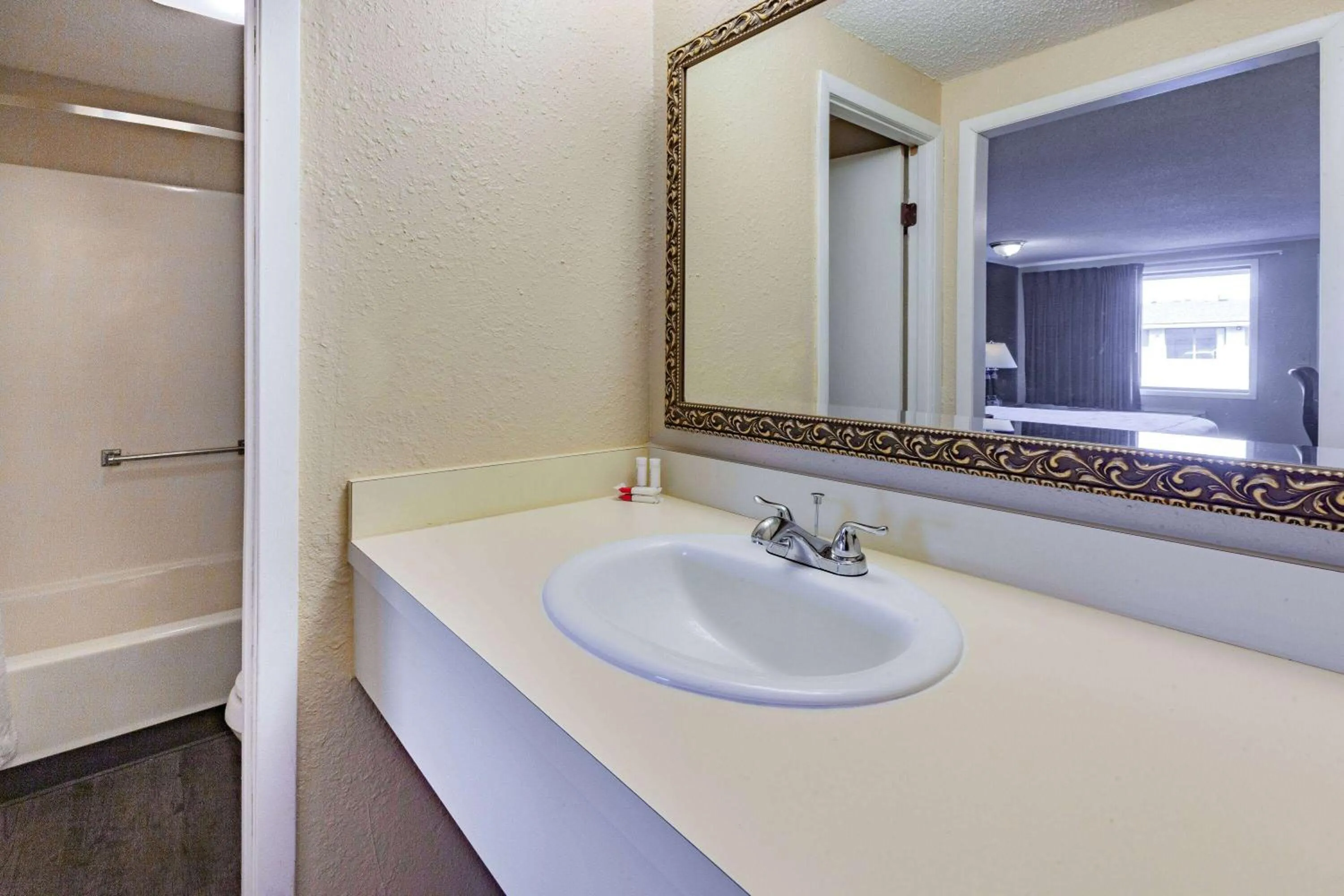 Bathroom in Travelodge by Wyndham Monroe