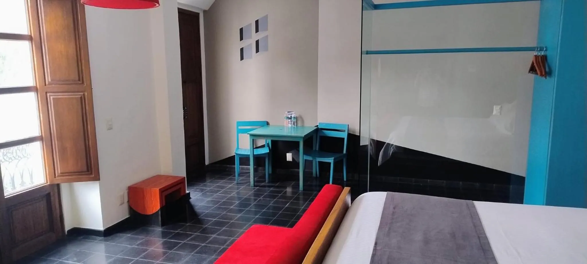 Photo of the whole room, Bed in Del Carmen Concept Hotel Boutique by Chai