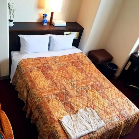 Bed in Nobeoka Urban Hotel