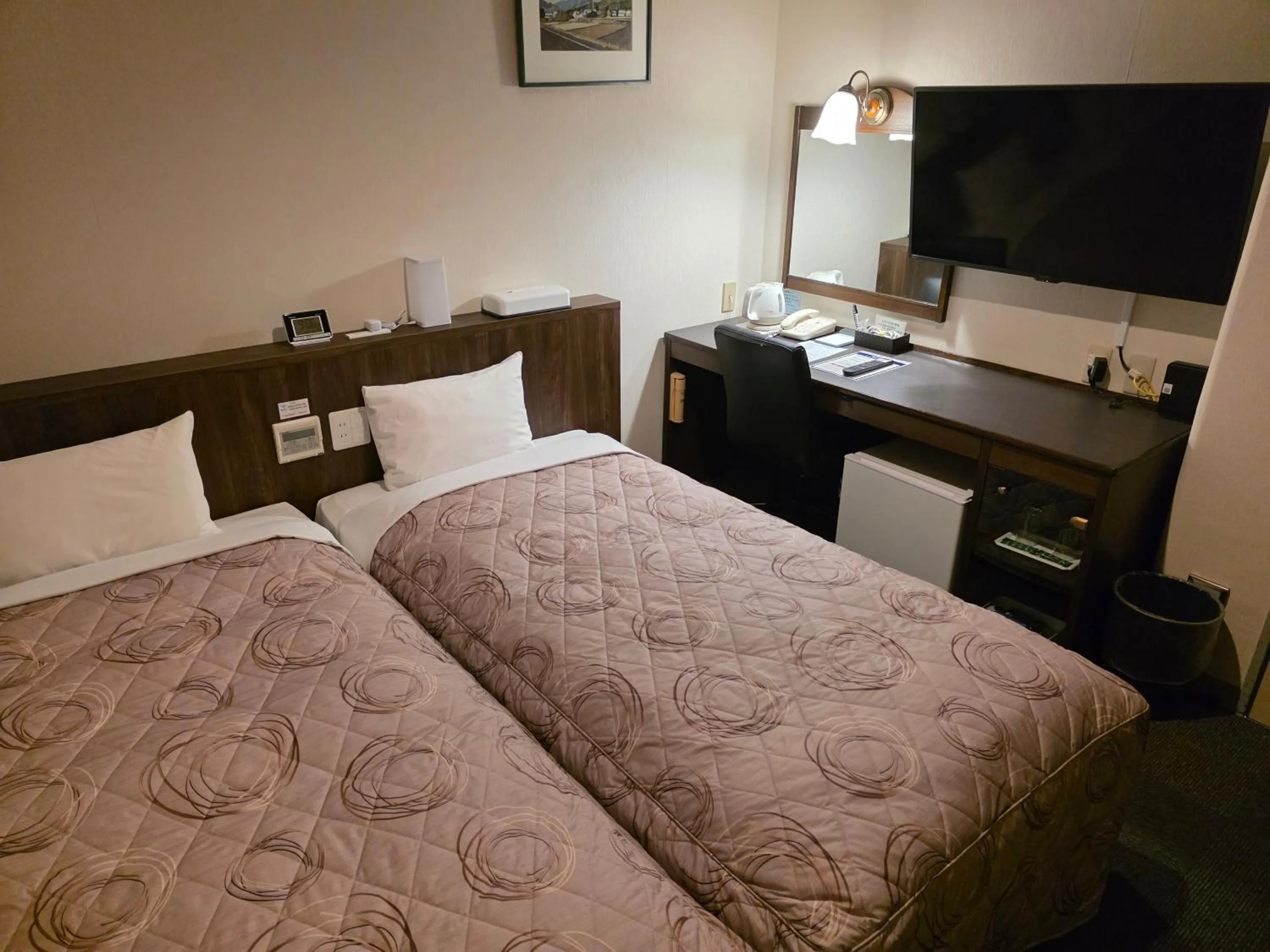 Bed in Nobeoka Urban Hotel