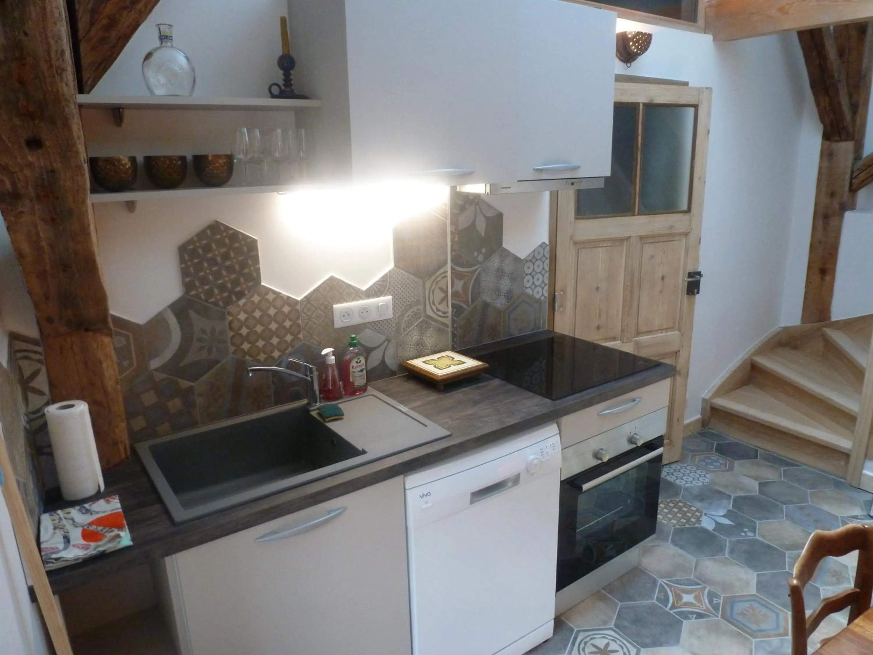 Kitchen or kitchenette in Au Cheval Blanc - appartements et chambres d'hôtes