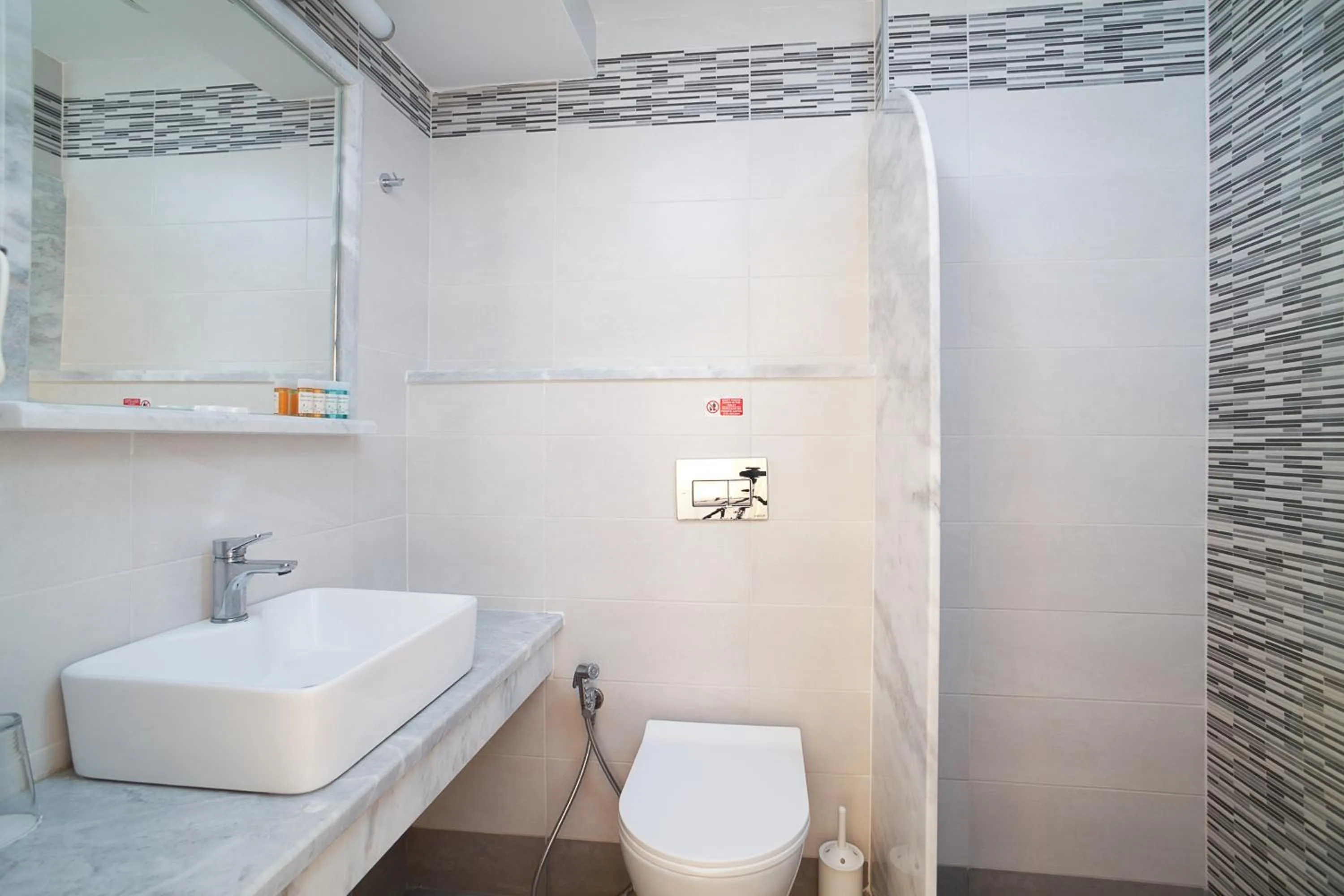 Bathroom in Amaryllis Hotel