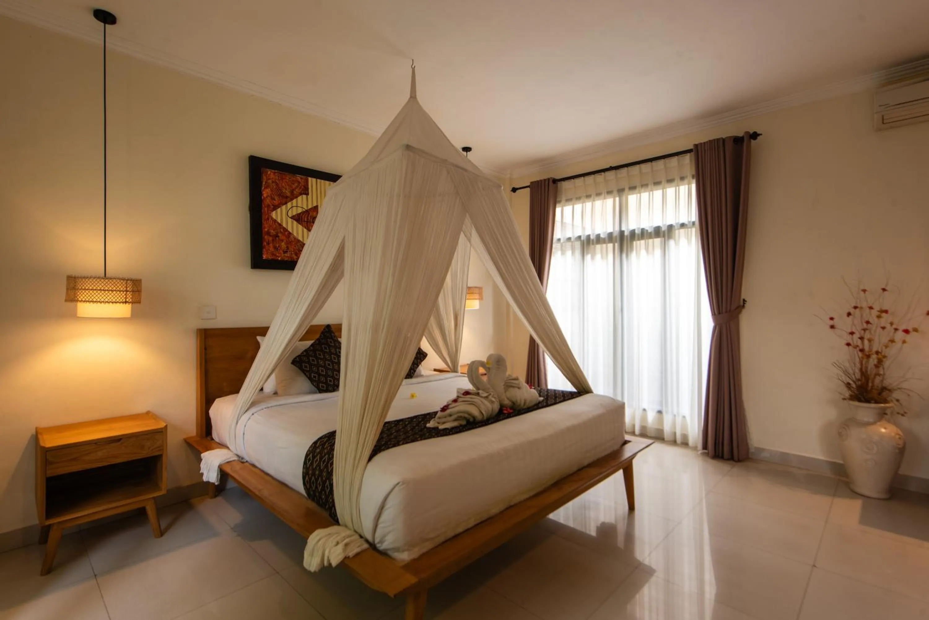 Bed in Bali Ayu Hotel & Villas