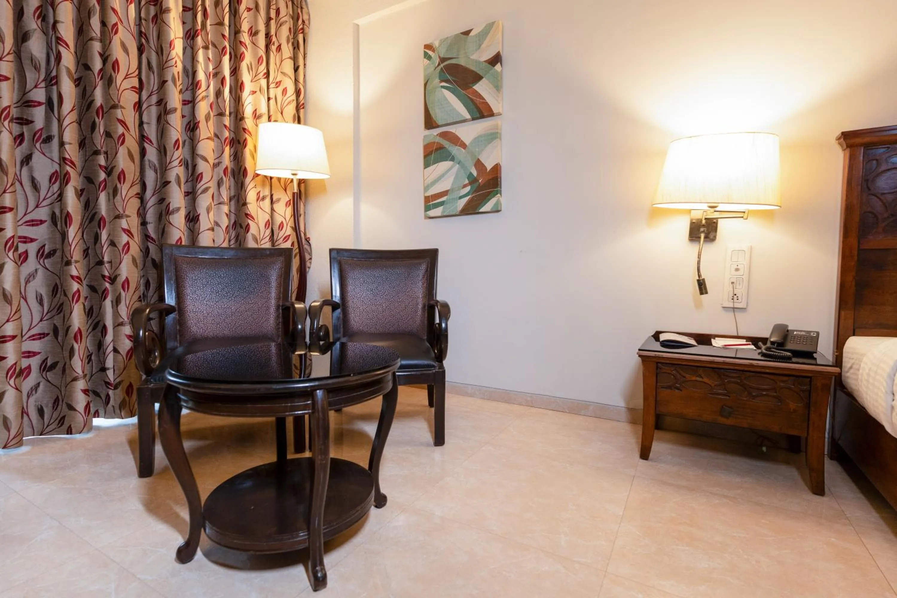 Seating area in Neelam's The Grand Hotel Goa