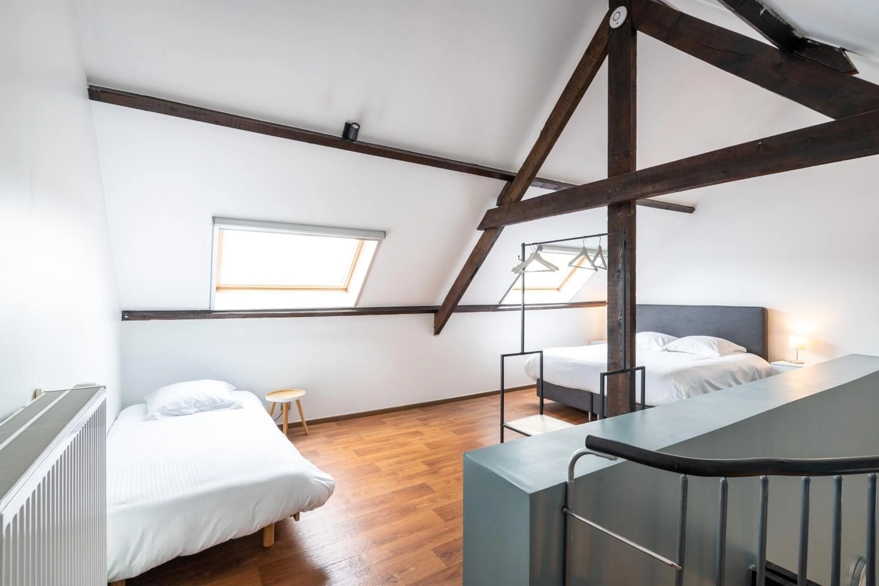 Bed in The Rose Suites