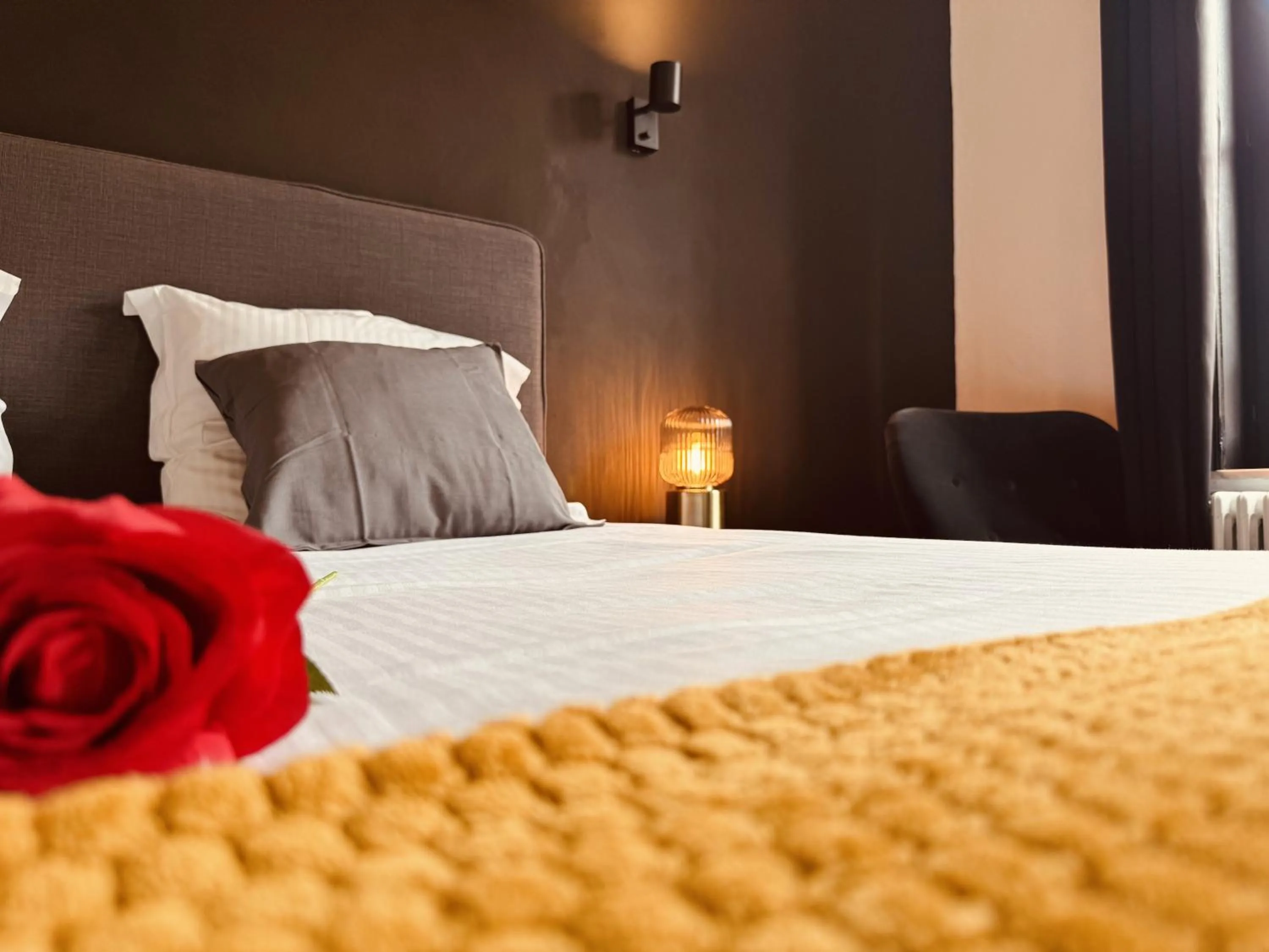 Bed in The Rose Suites