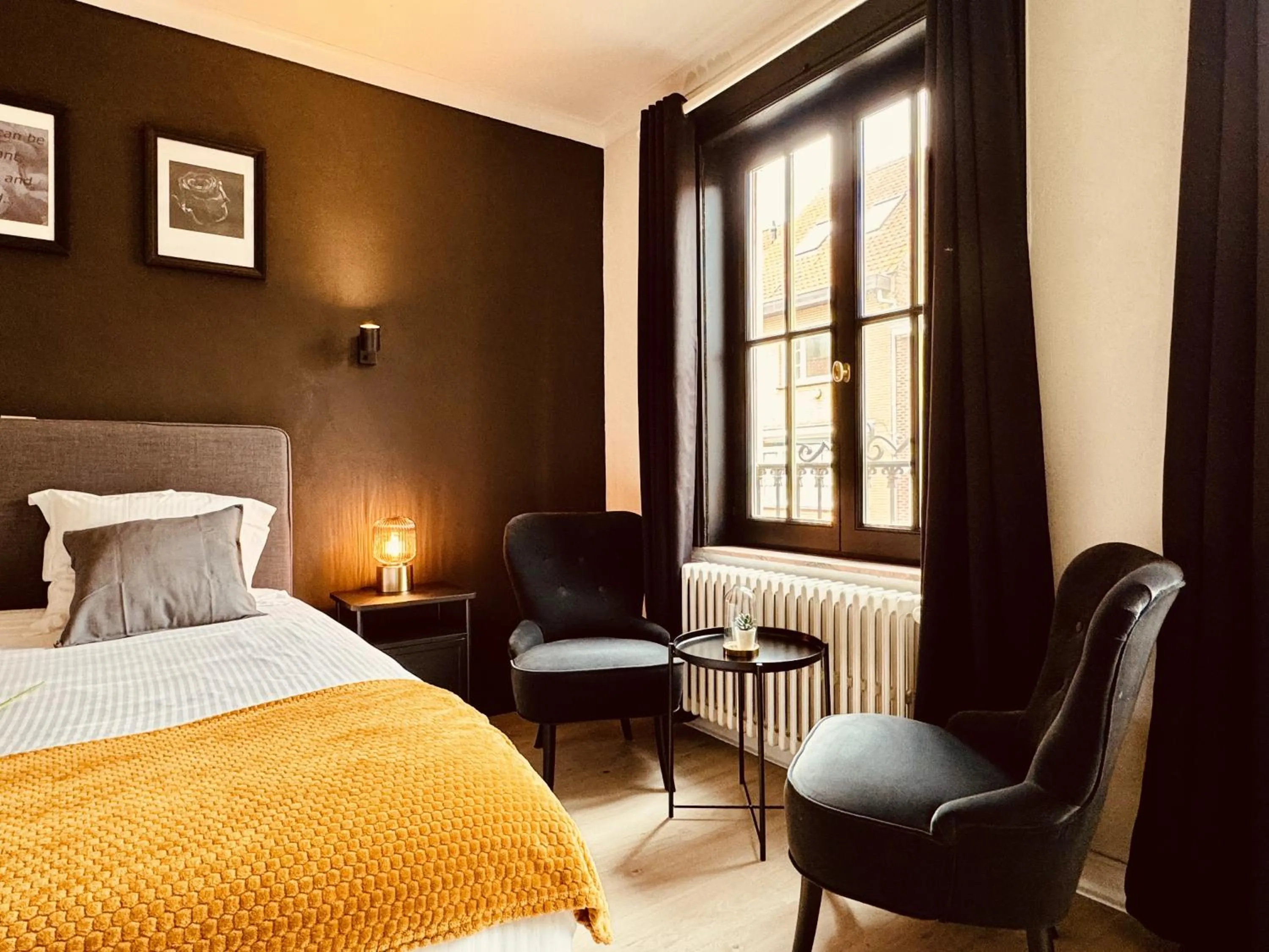 Bed in The Rose Suites