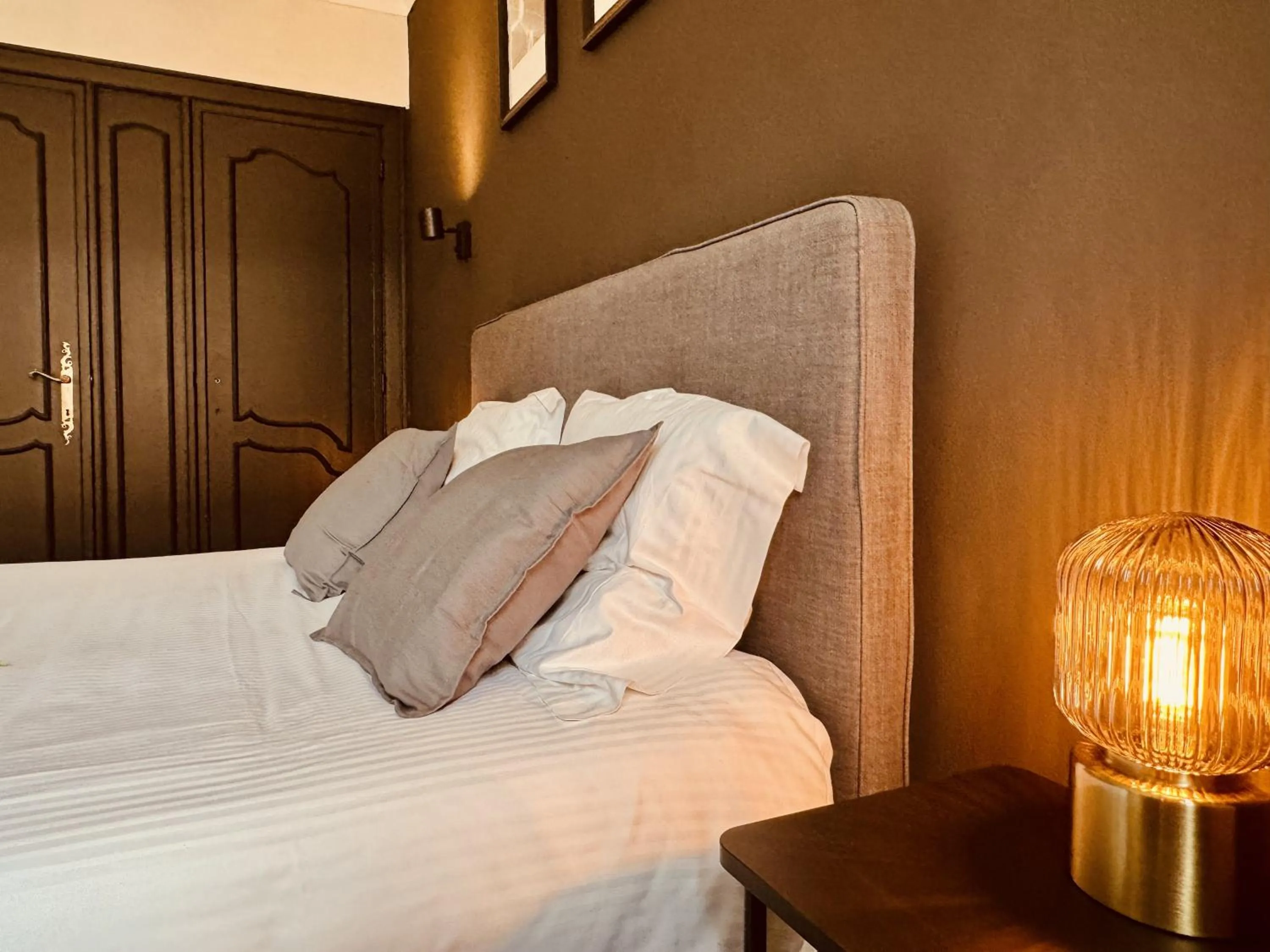 Bed in The Rose Suites