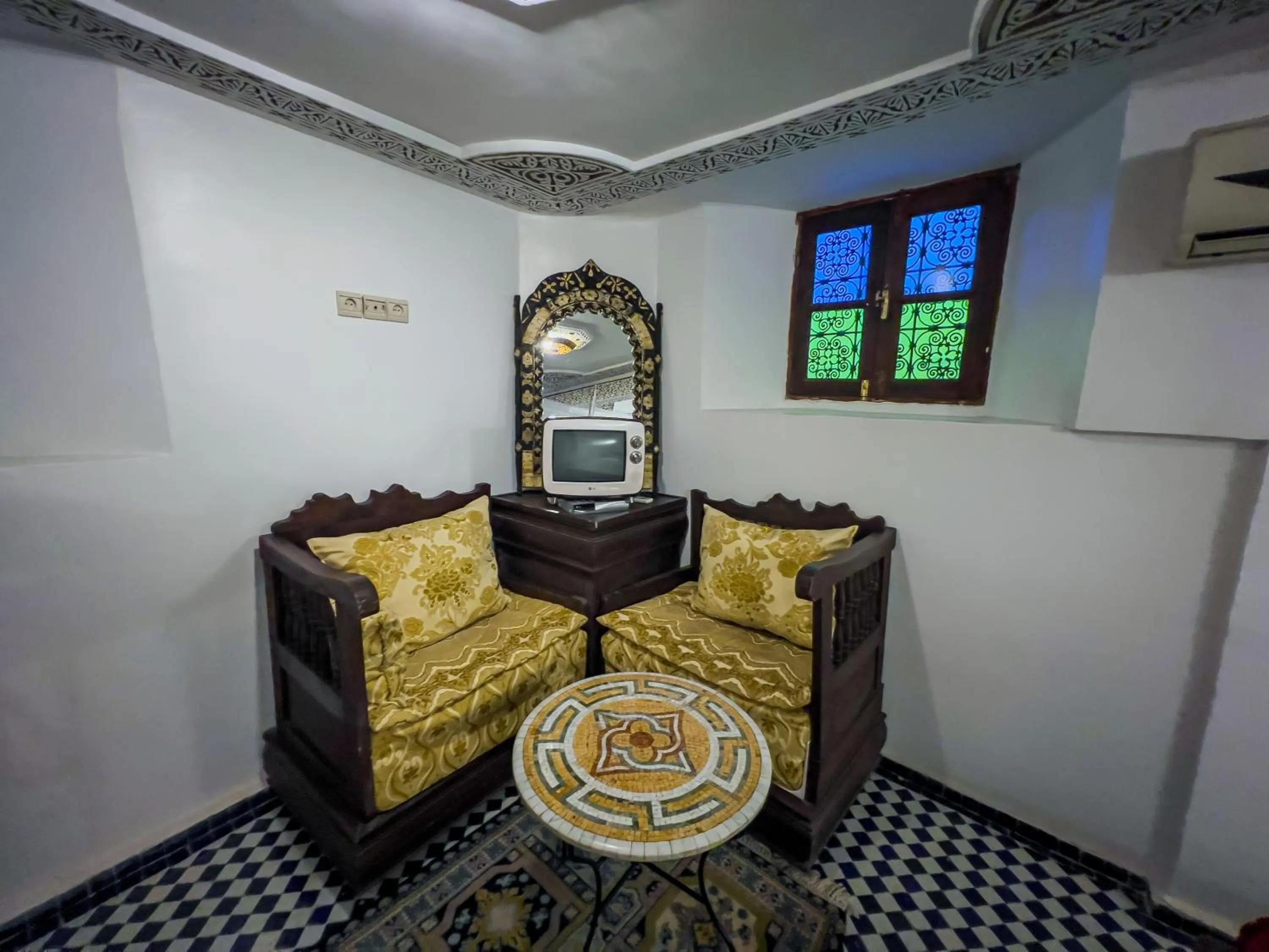 Seating area in Riad Dar Guennoun - Luxury Suites in the Heart of Fes