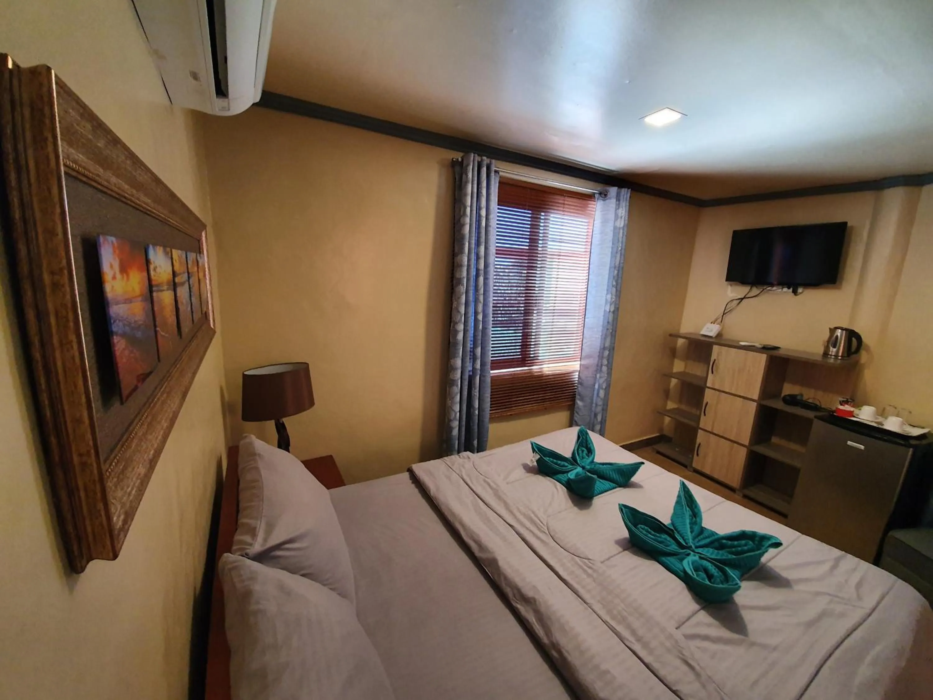 Bed in UNK'S HOUSE HOMESTAY