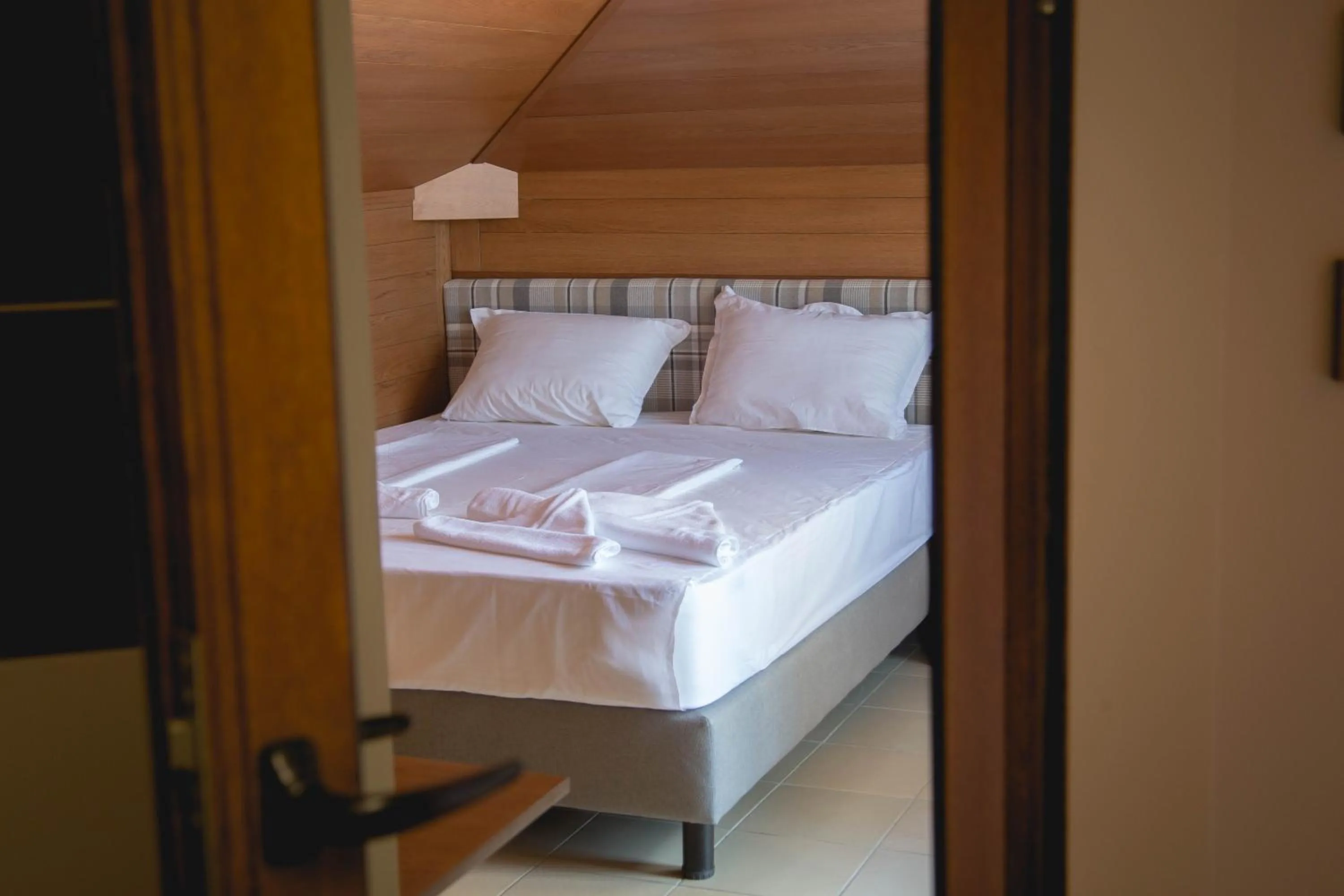 Bed in Prince Cyril Hotel