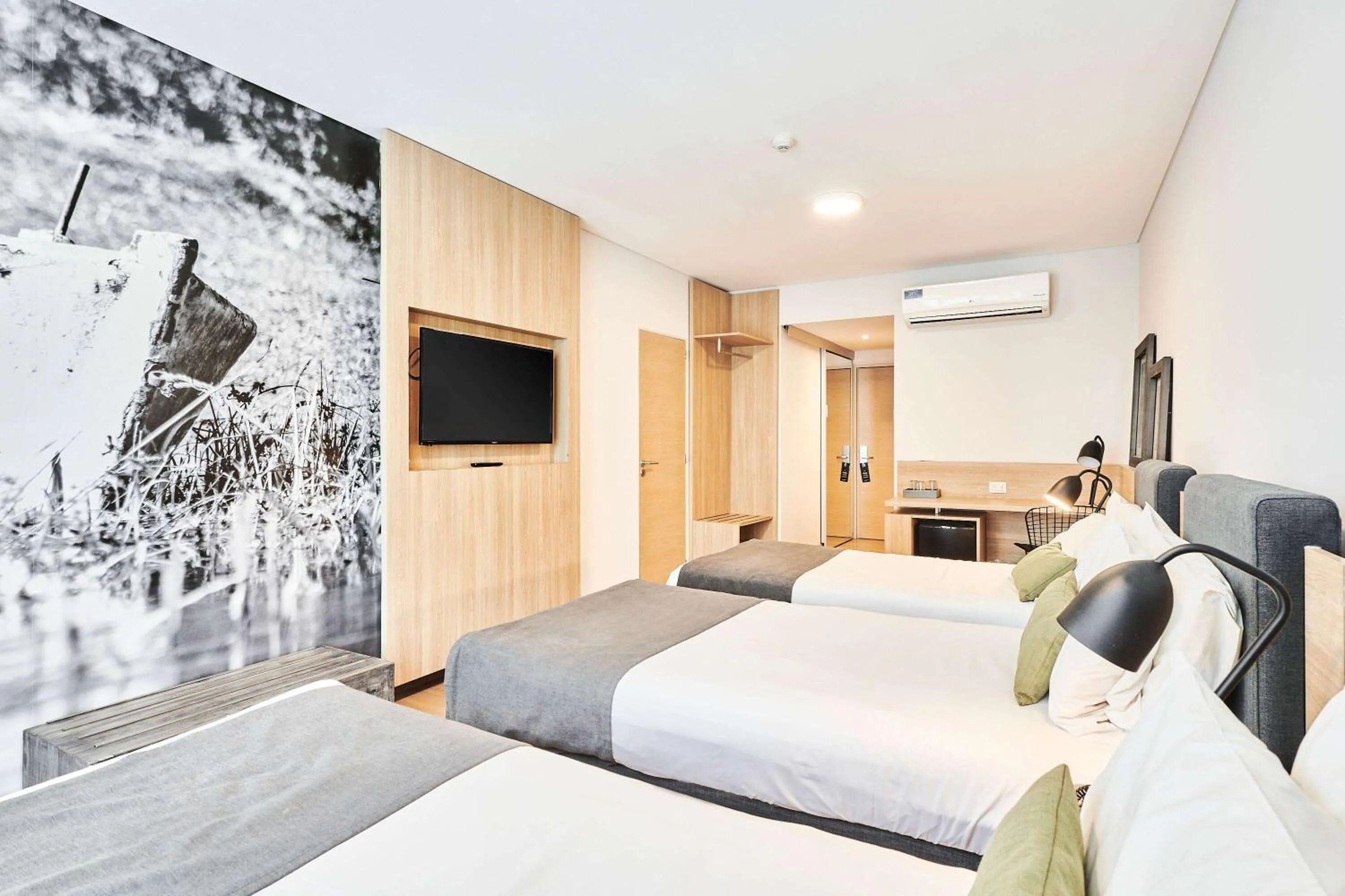 Photo of the whole room, Bed in Dazzler by Wyndham Rosario