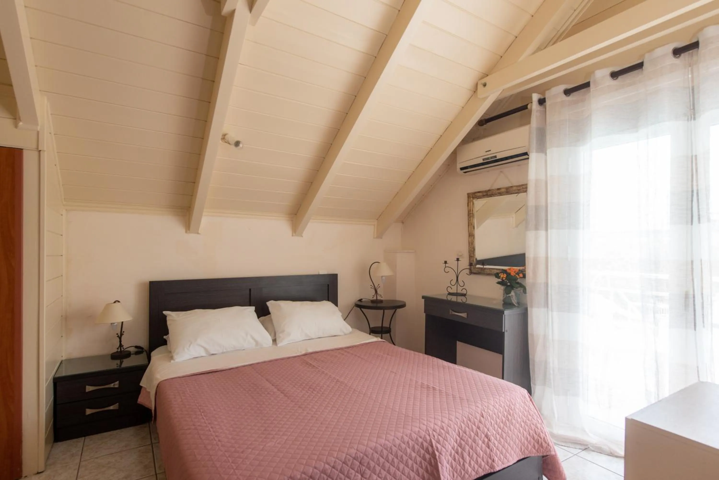 Bed in Tsolakis Studios & Apartments