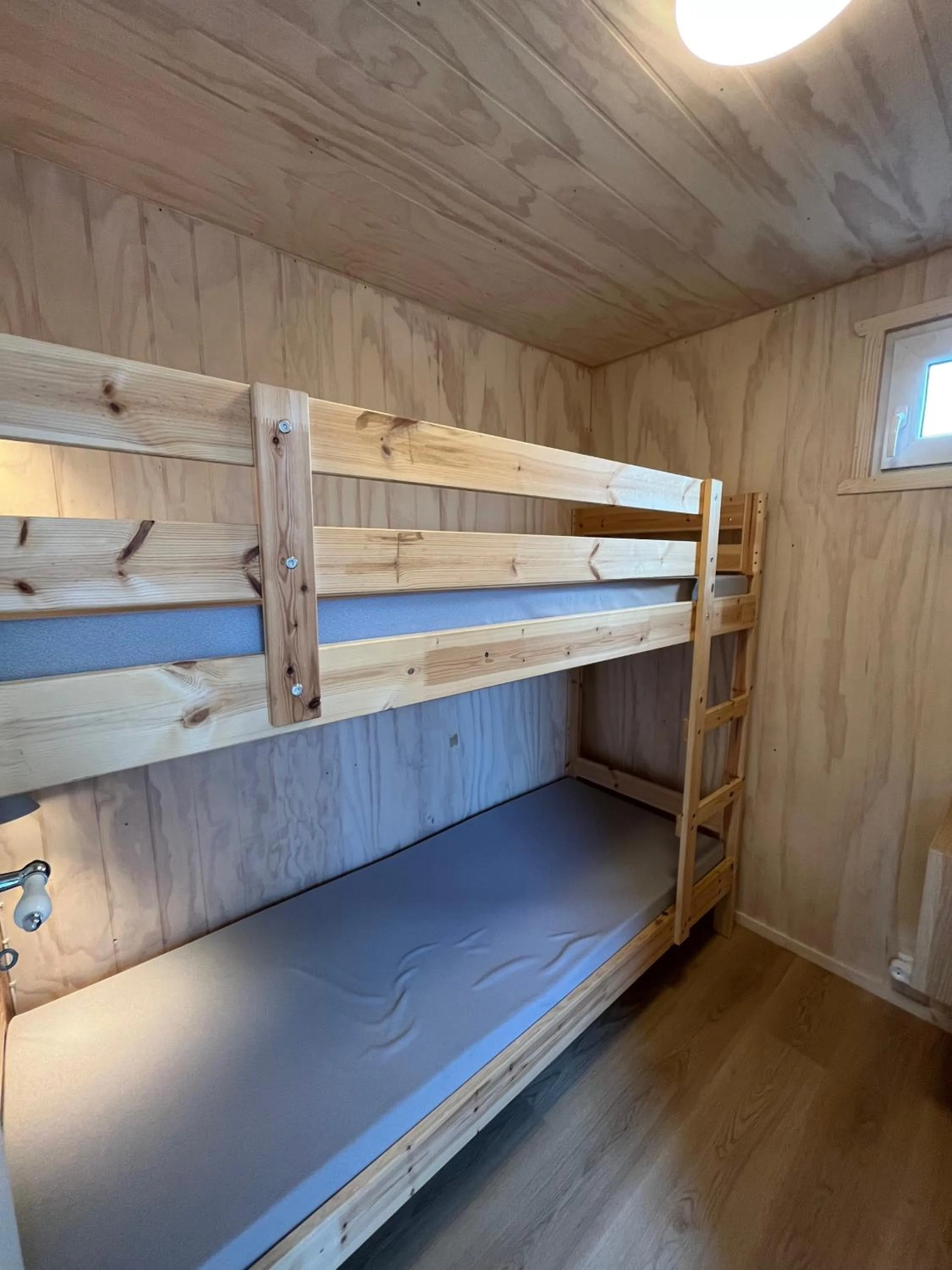 Bed in Løkken Family Camping & Guesthouse