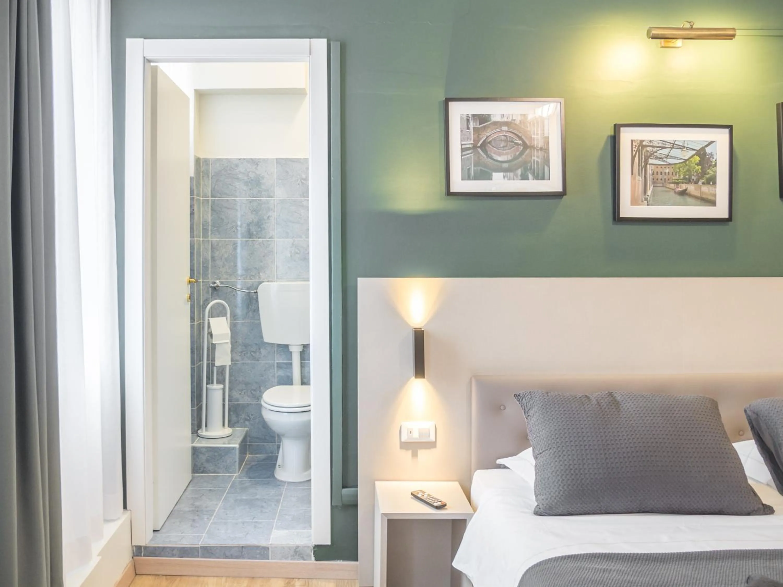 Bed in Grand Canal Suite by Wonderful Italy