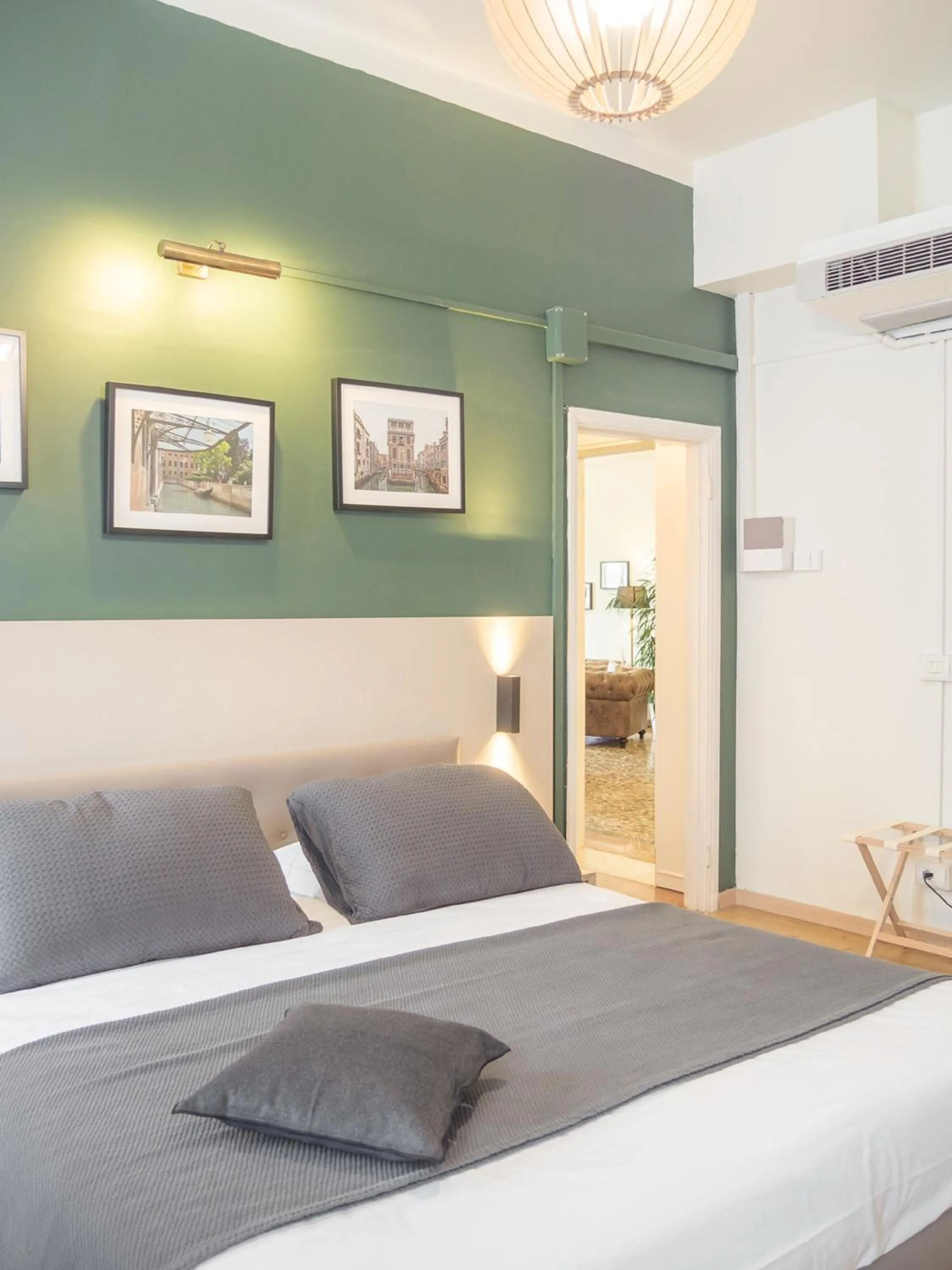 Bed in Grand Canal Suite by Wonderful Italy