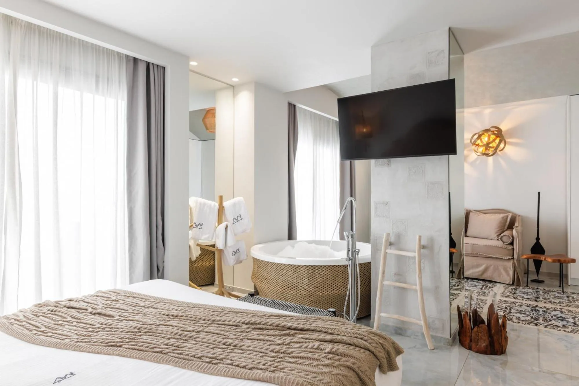 Bed in Blue Carpet Luxury Suites