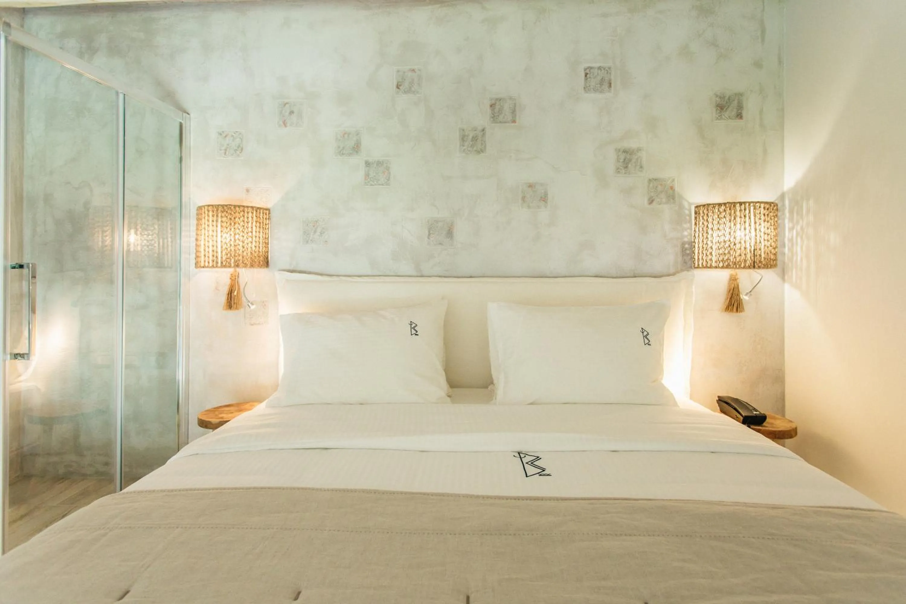 Bed in Blue Carpet Luxury Suites