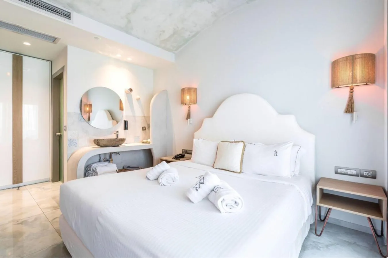 Bed in Blue Carpet Luxury Suites