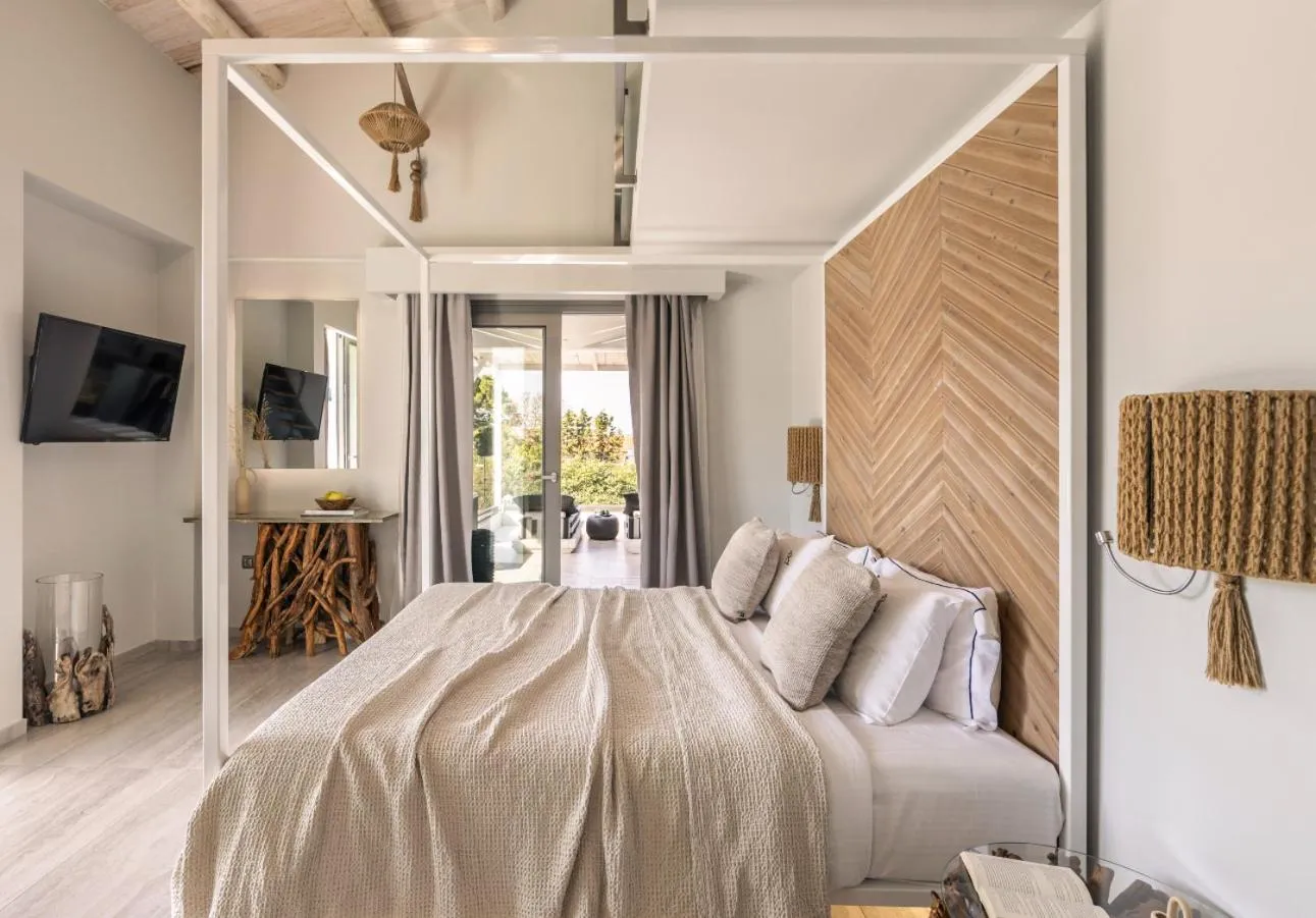 Bed in Blue Carpet Luxury Suites