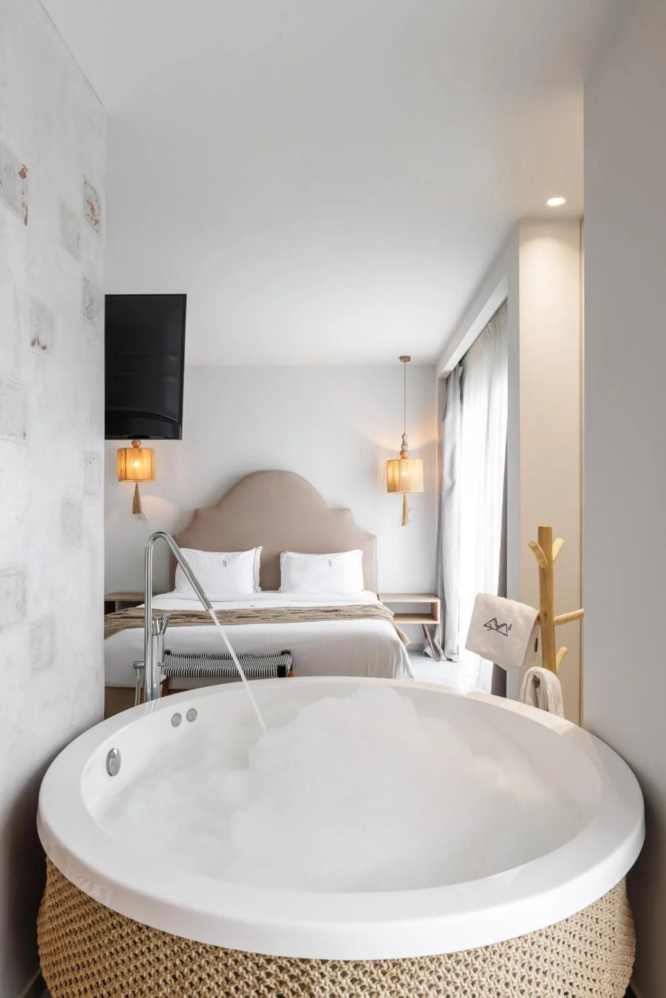 Bed in Blue Carpet Luxury Suites