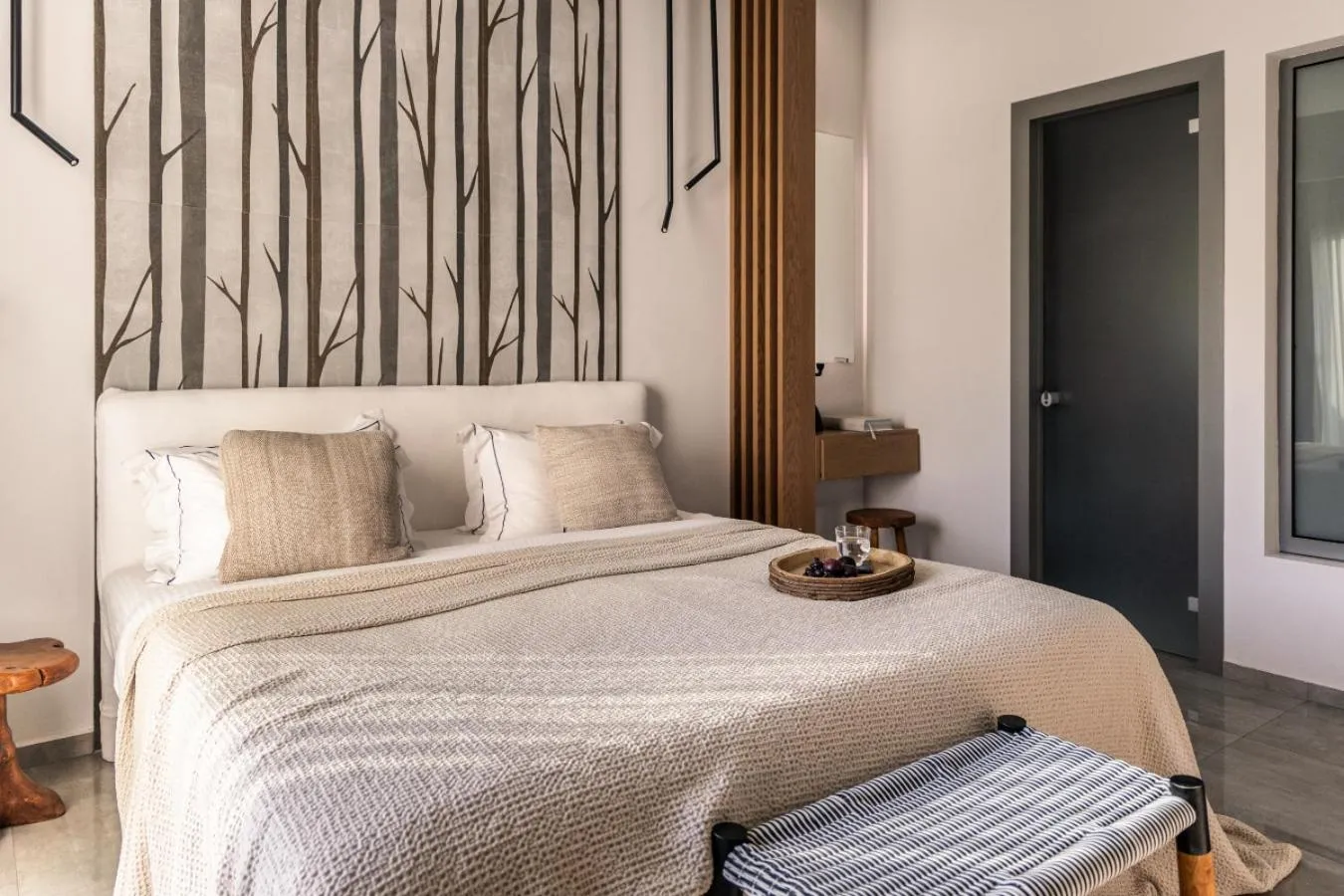 Bed in Blue Carpet Luxury Suites