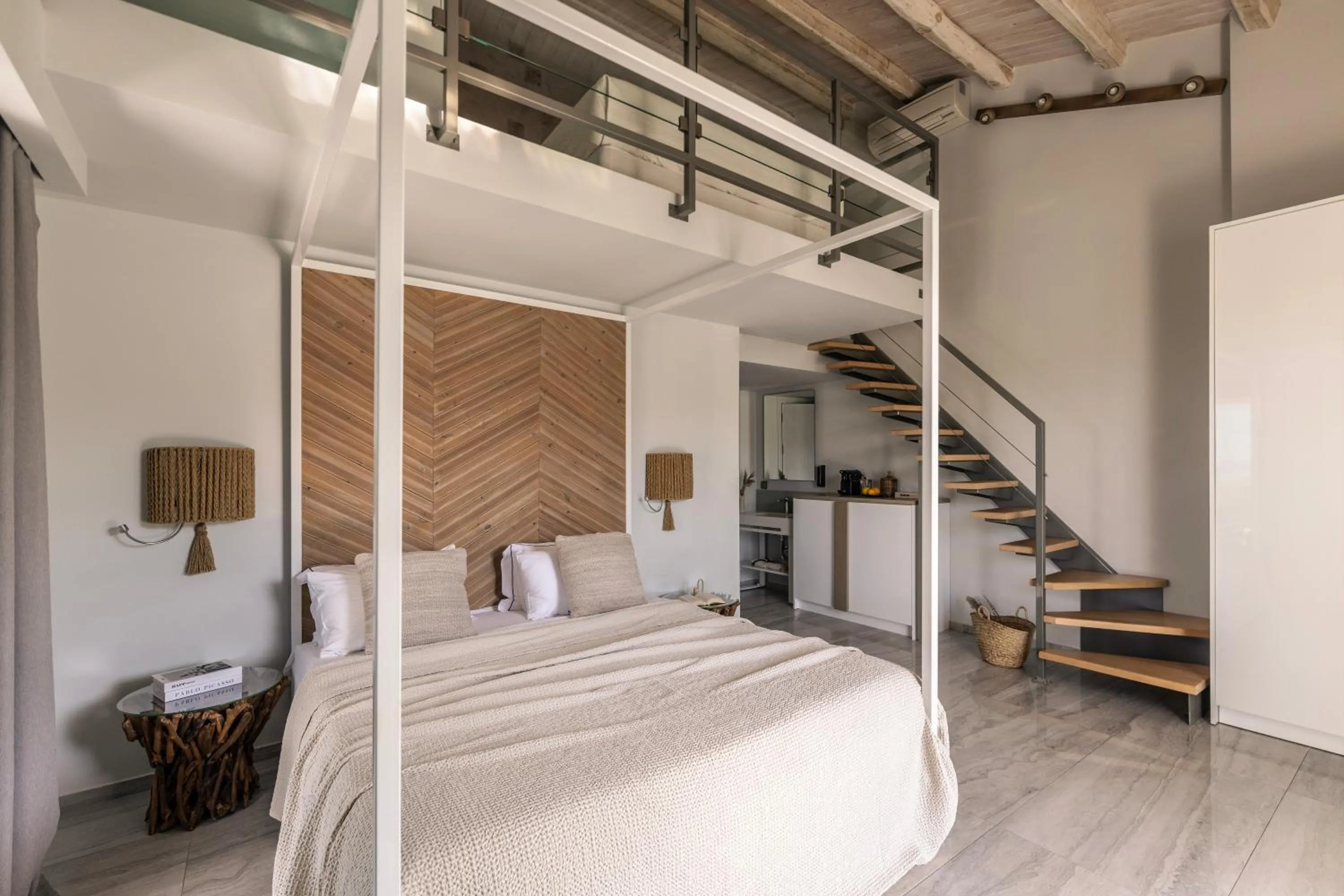 Bed in Blue Carpet Luxury Suites