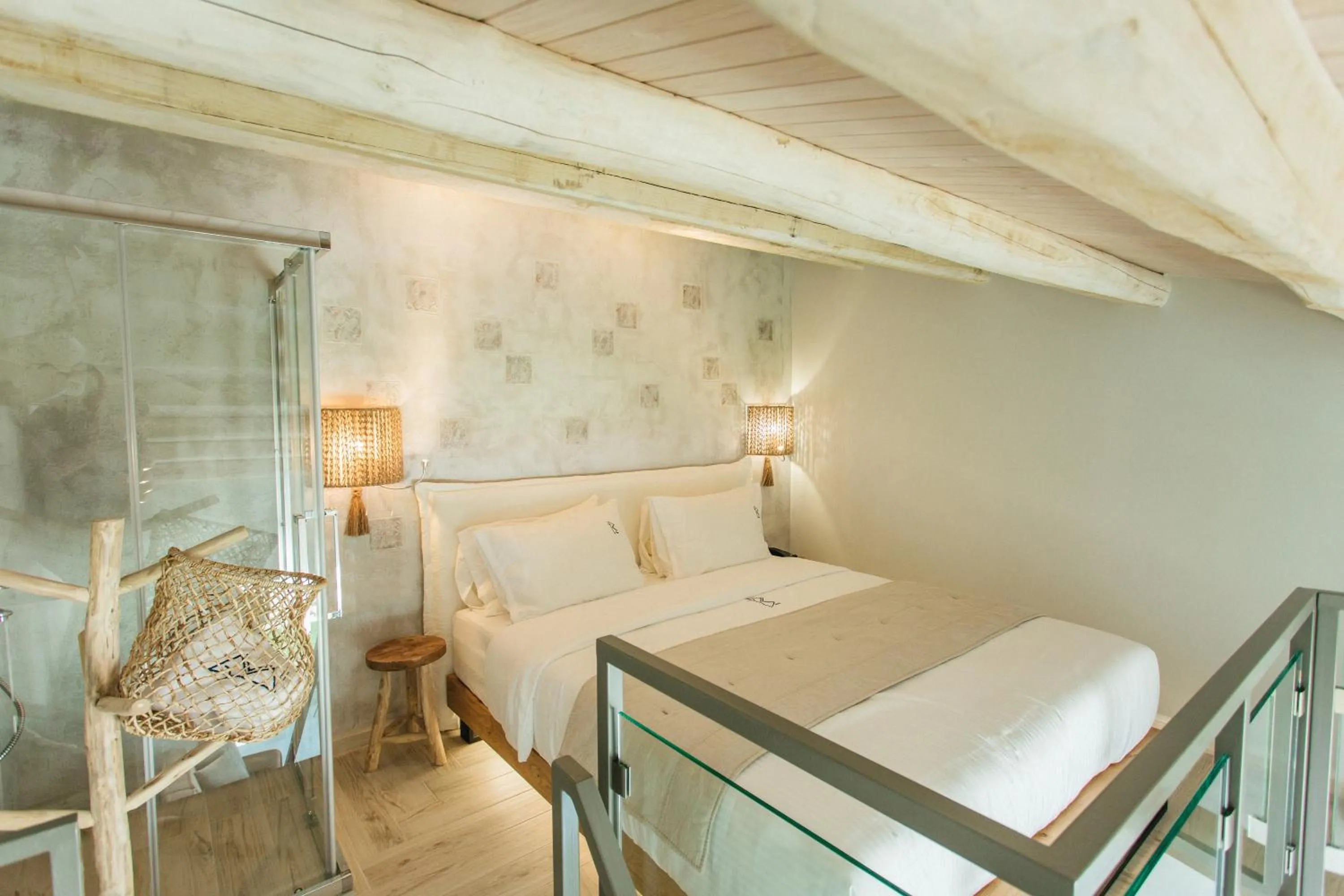 Bed in Blue Carpet Luxury Suites