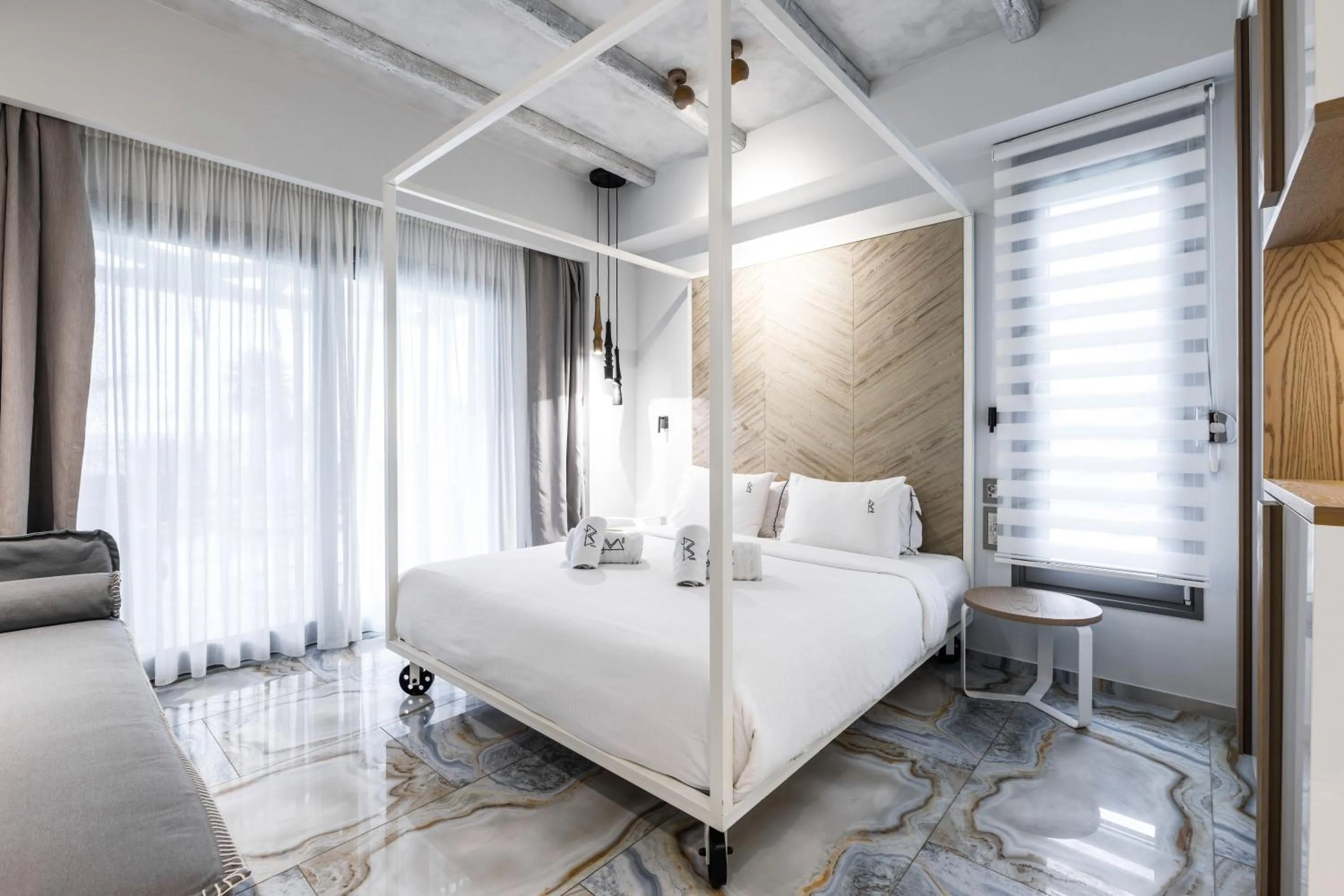 Bed in Blue Carpet Luxury Suites